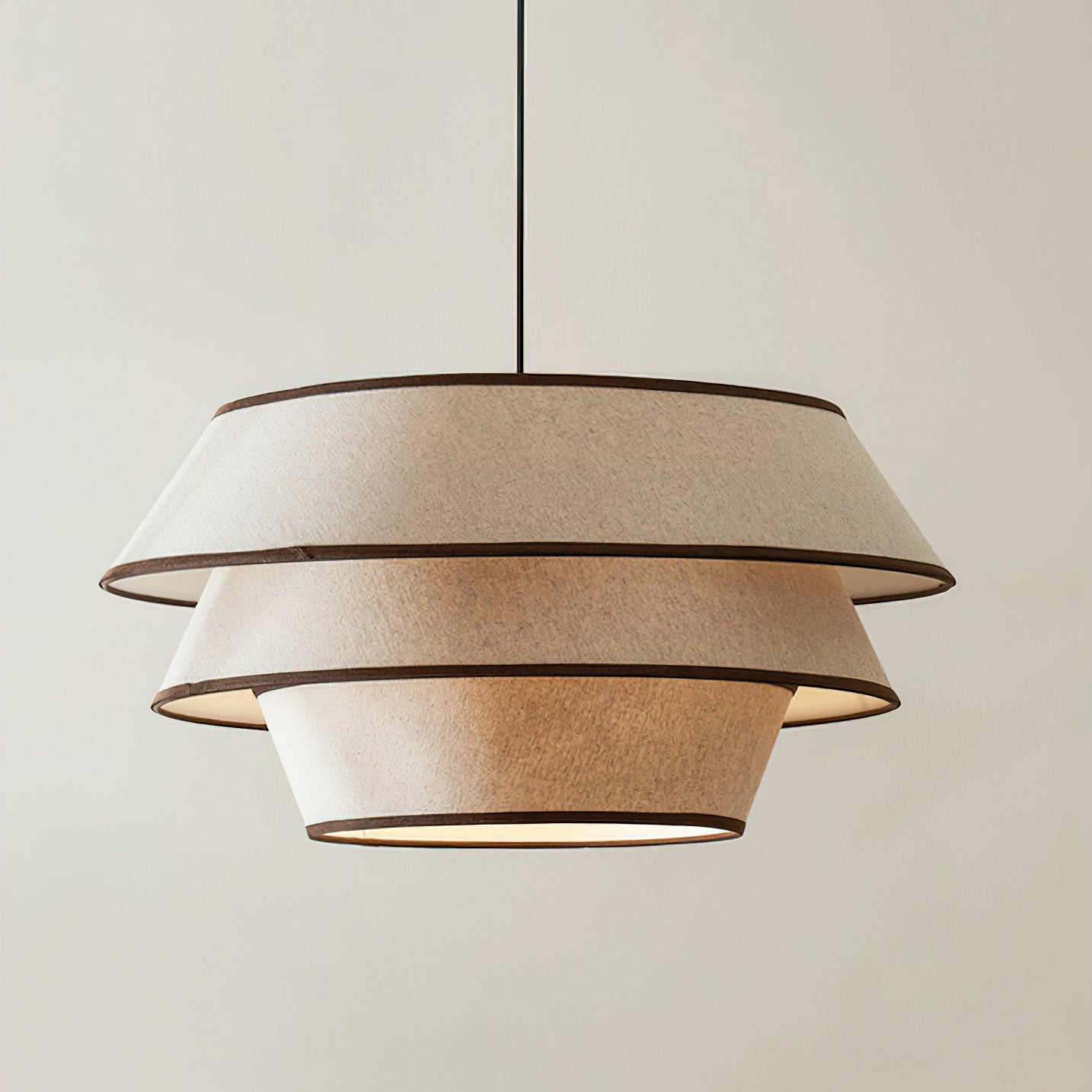 Lifestyle image of the Auden Pendant Light in a cozy reading nook.
