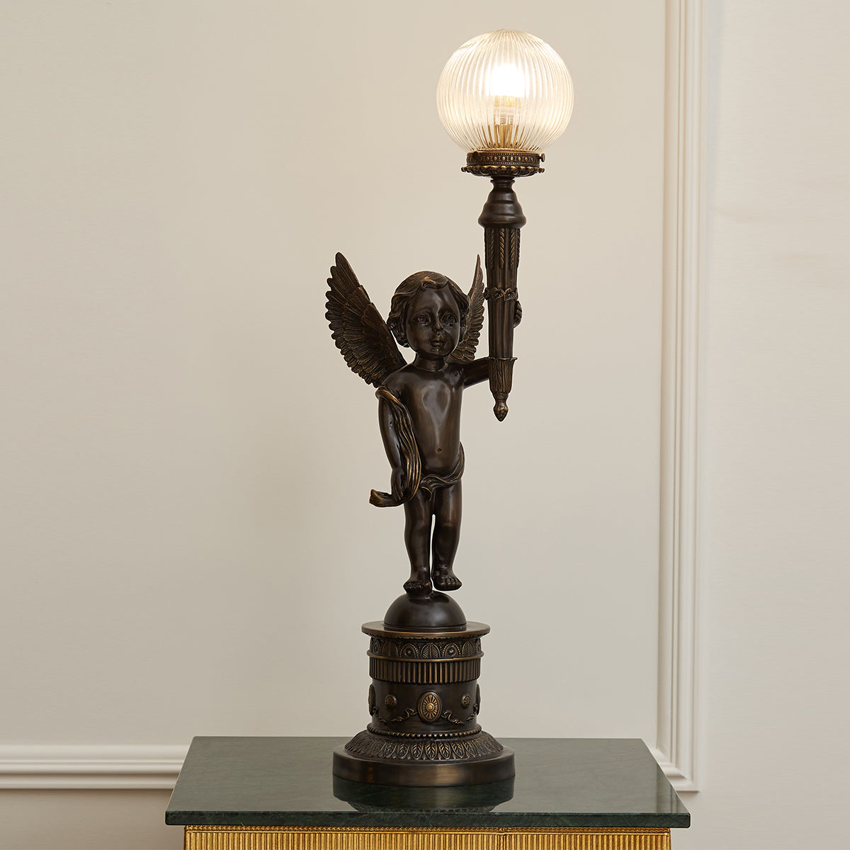 Another angle of the lamp, emphasizing its height and vintage appeal.