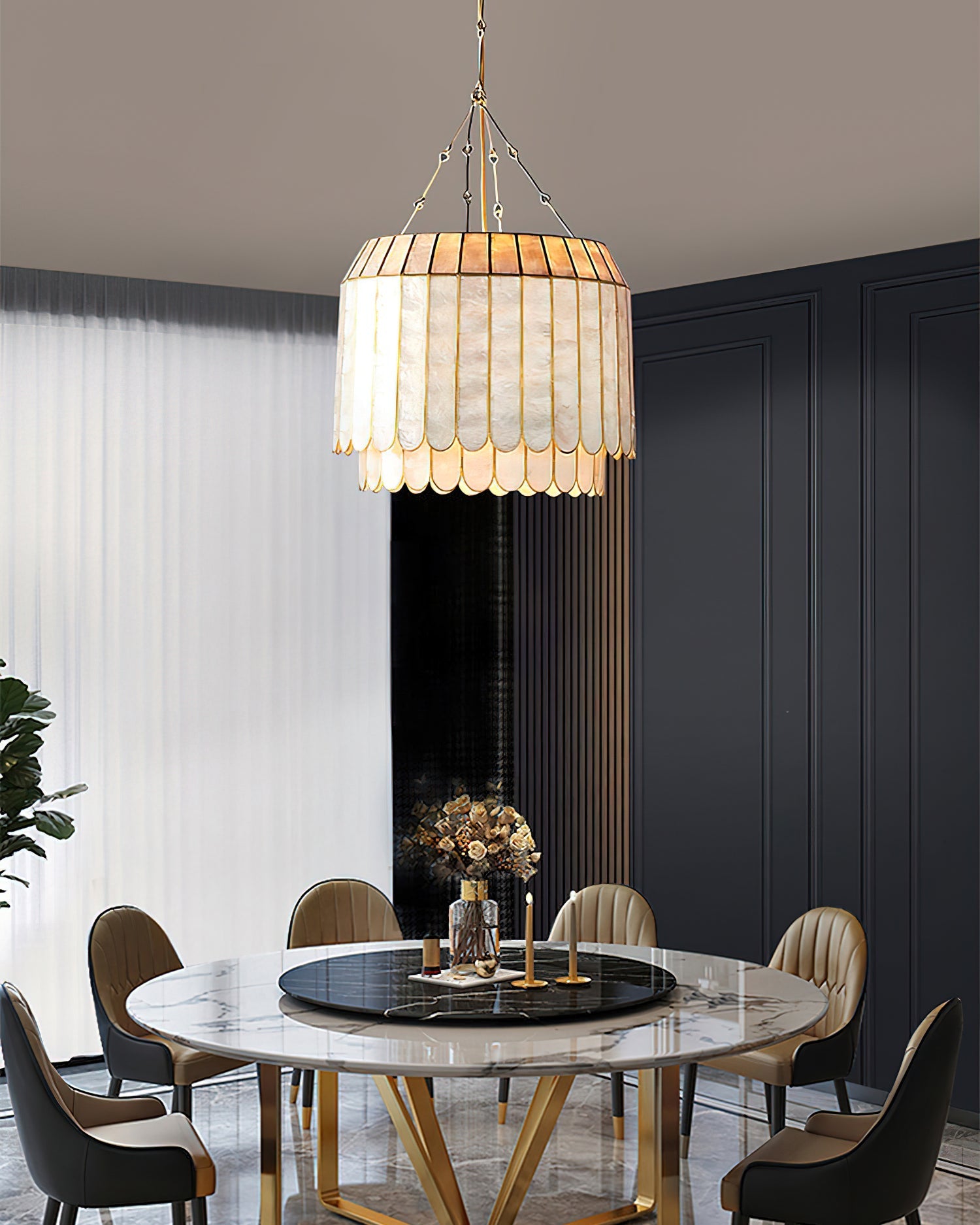 Lifestyle image of the Aurelia lamp in a modern coastal-style bedroom.