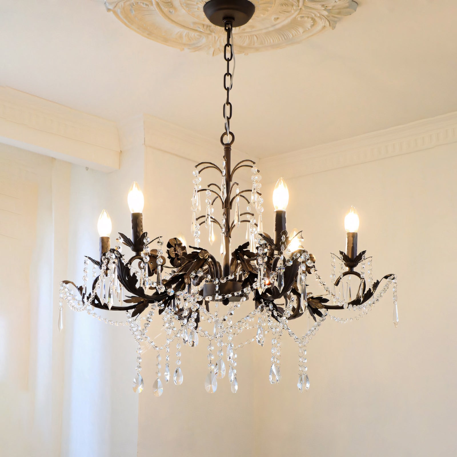 Close-up of the hand-painted floral details on the Aurelia Chandelier.