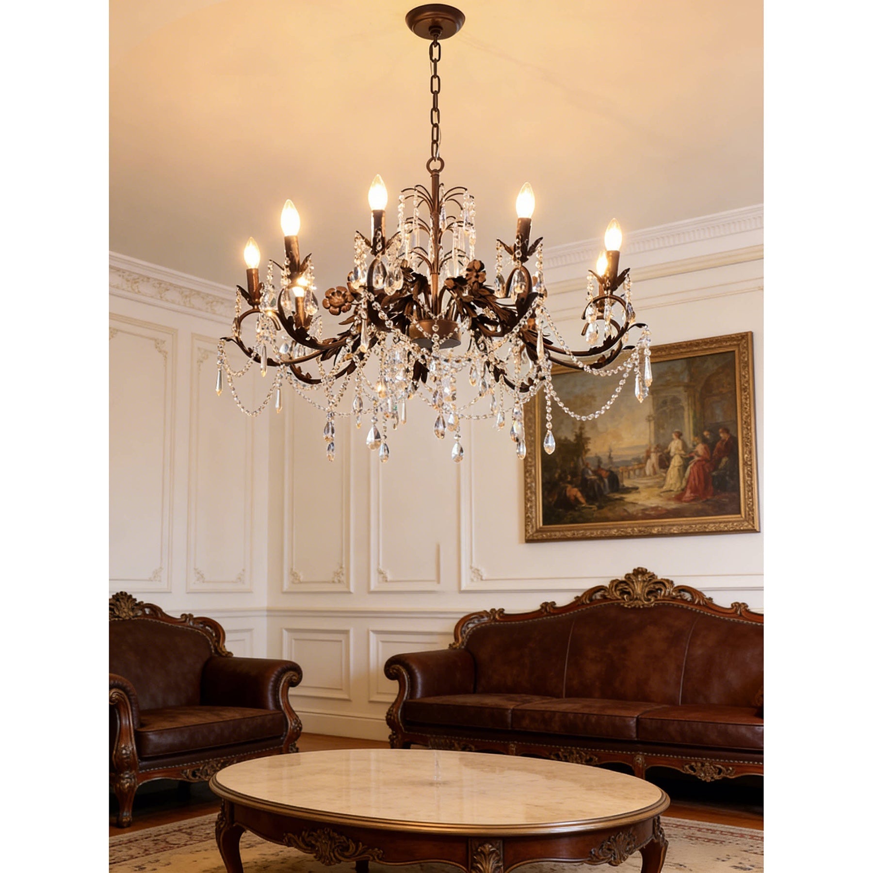 The metal frame and floral carvings of the chandelier.