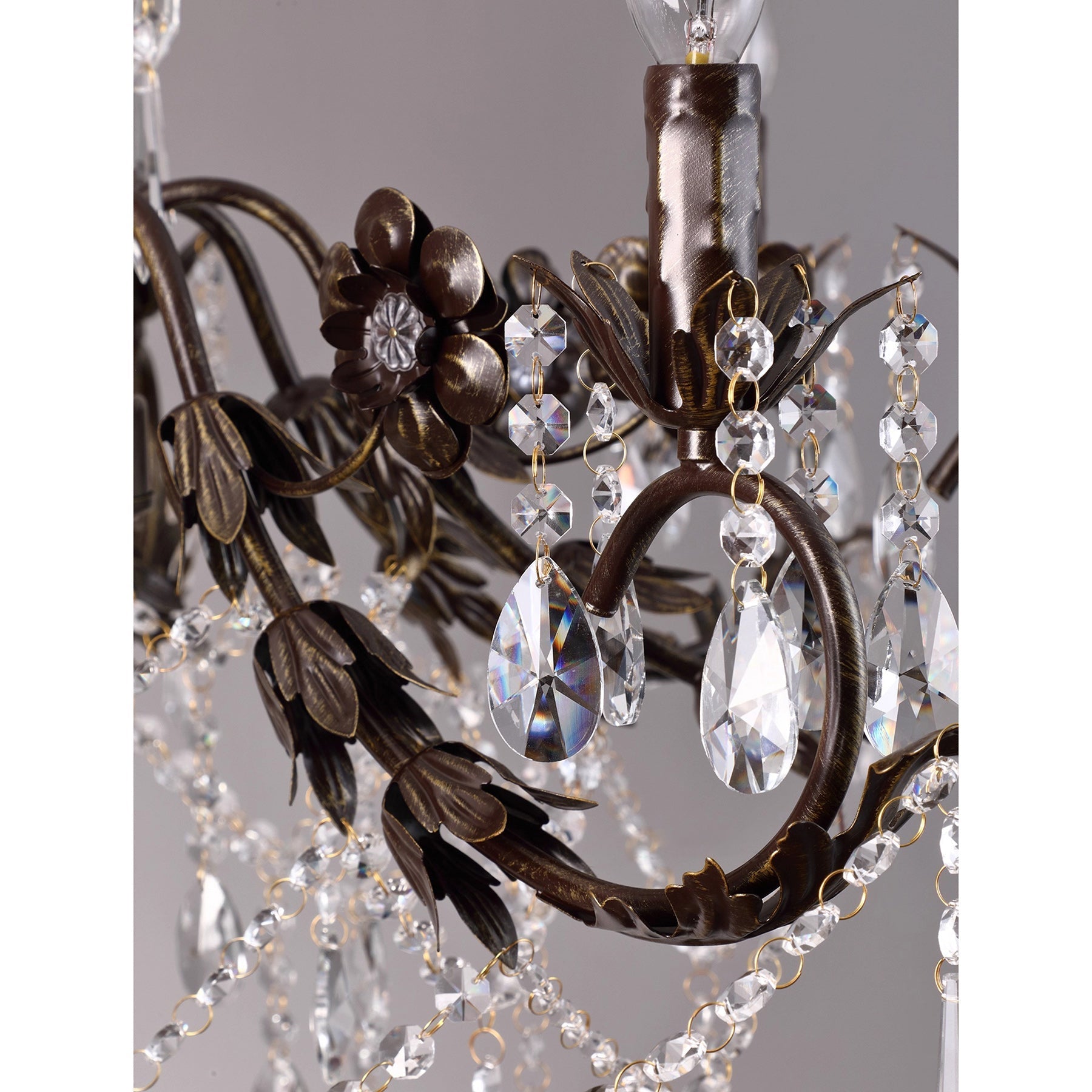 The chandelier's silhouette against a window.