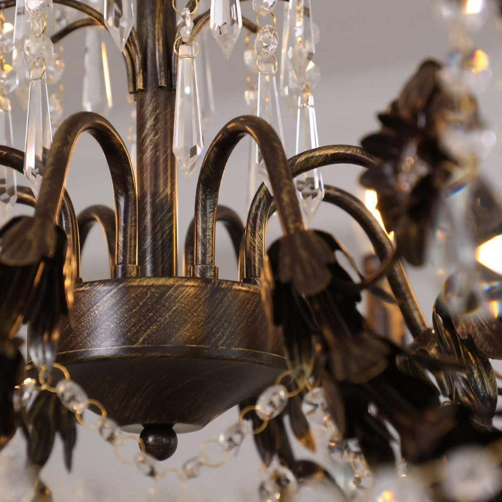 Close-up of a single candlestick arm with crystal.