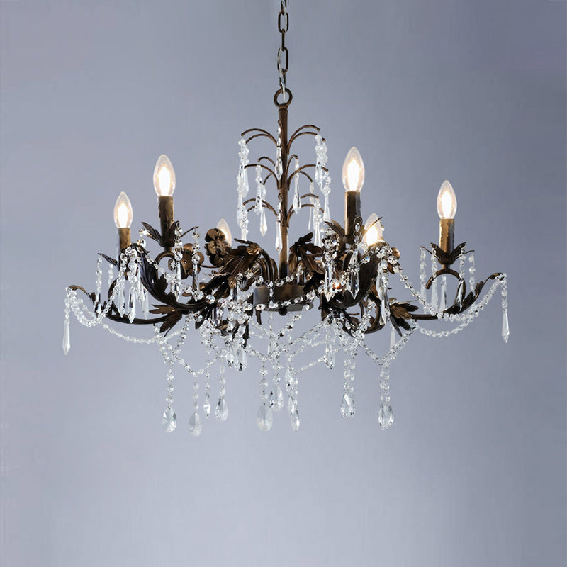 Aurelia Chandelier shown in a bedroom with classic decor.