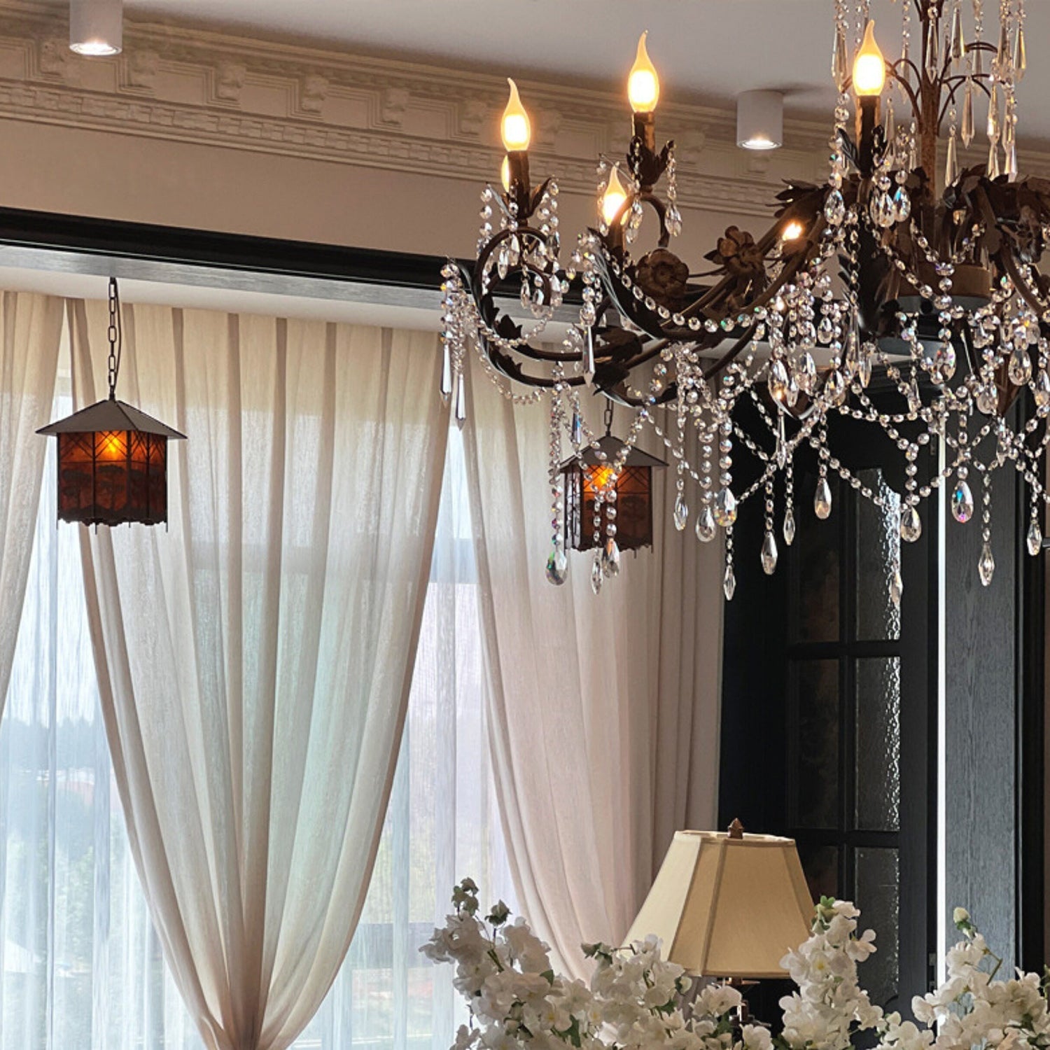 The 10-head version of the Aurelia Floral Chandelier, showcasing its larger size.
