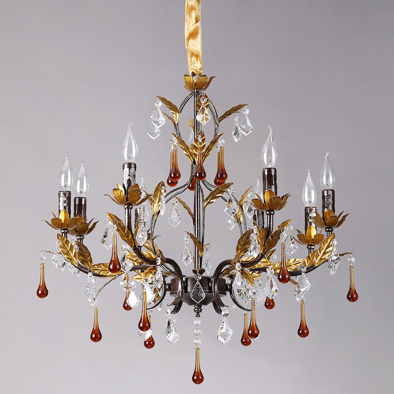 The organic, vine-like structure of the chandelier's main body.