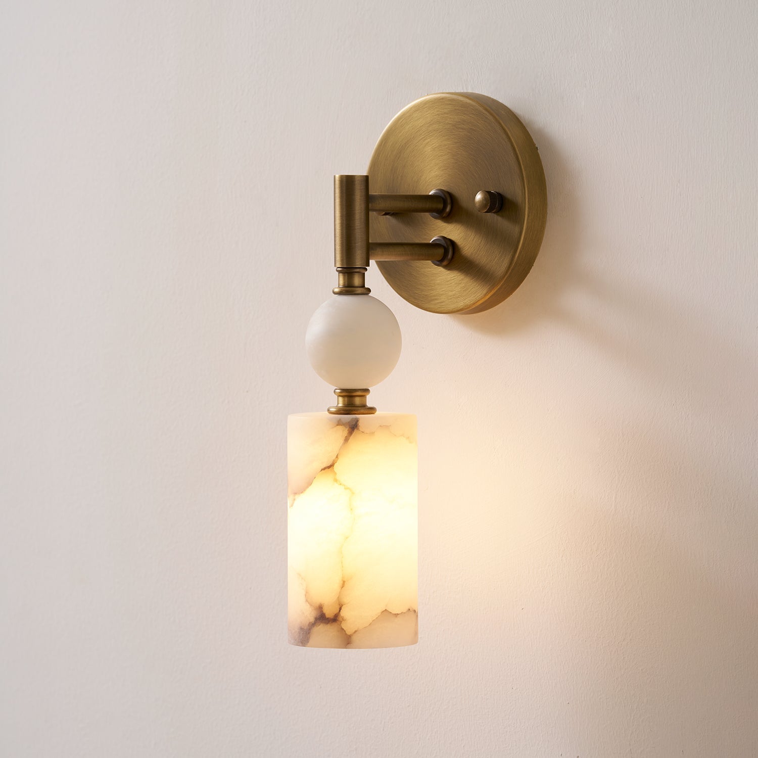 Front view of the Kingston Marble Wall Lamp against a plain wall.