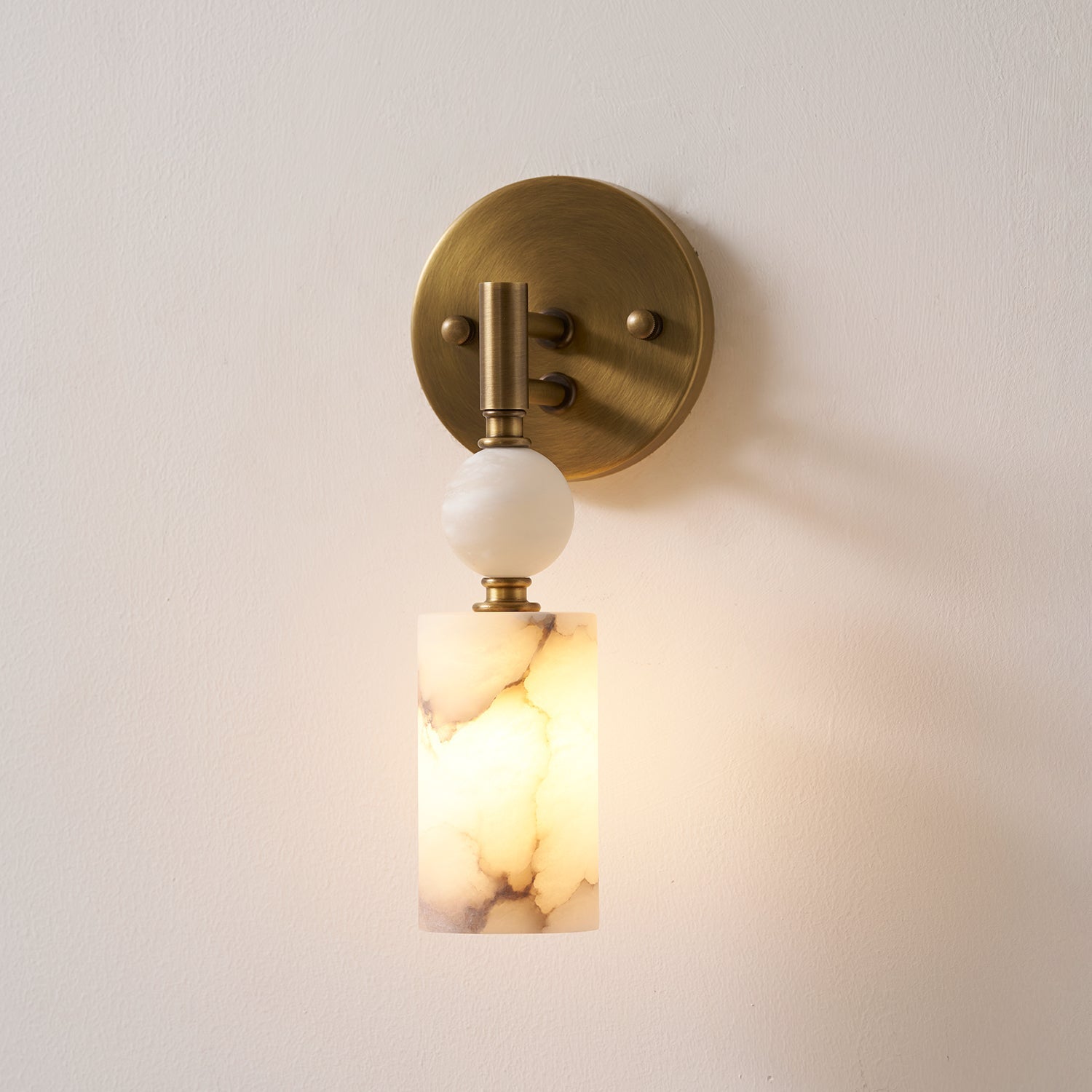 Close-up detail of the natural white marble veining on the lampshade.