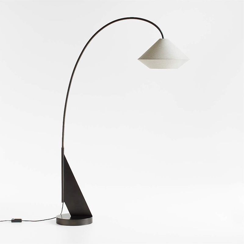 Close-up of the Avenir Arc Floor Lamp's fabric shade and metal stem.