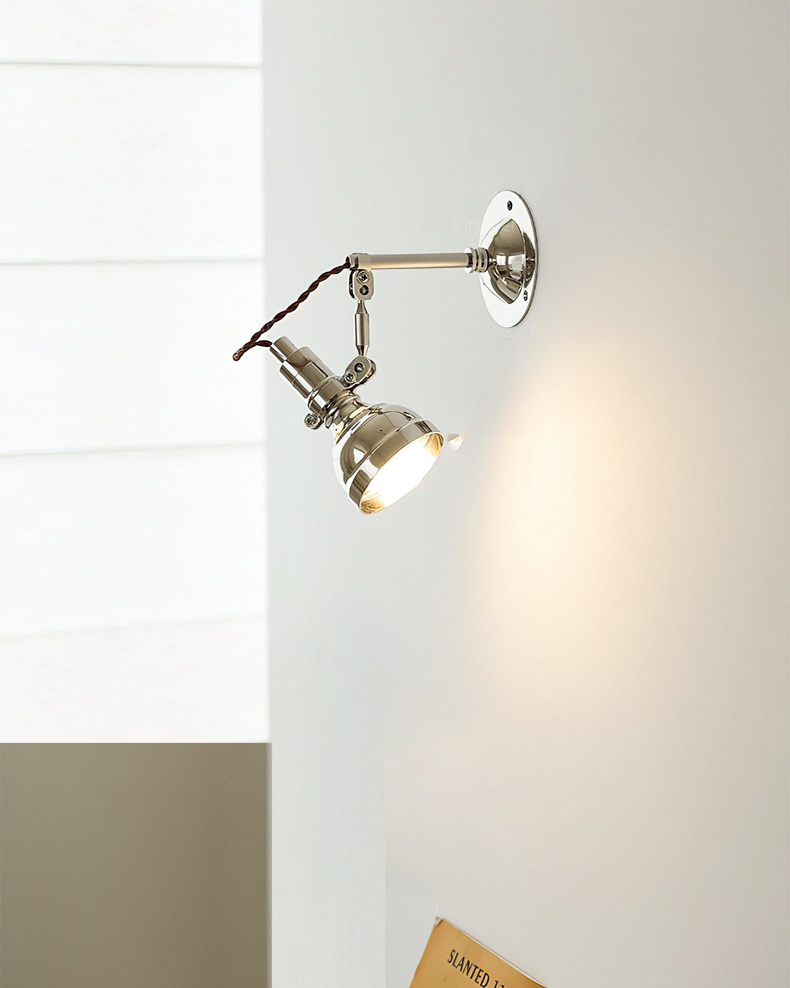 Model A of the Avonni Swing Arm Wall Lamp shown from the front.