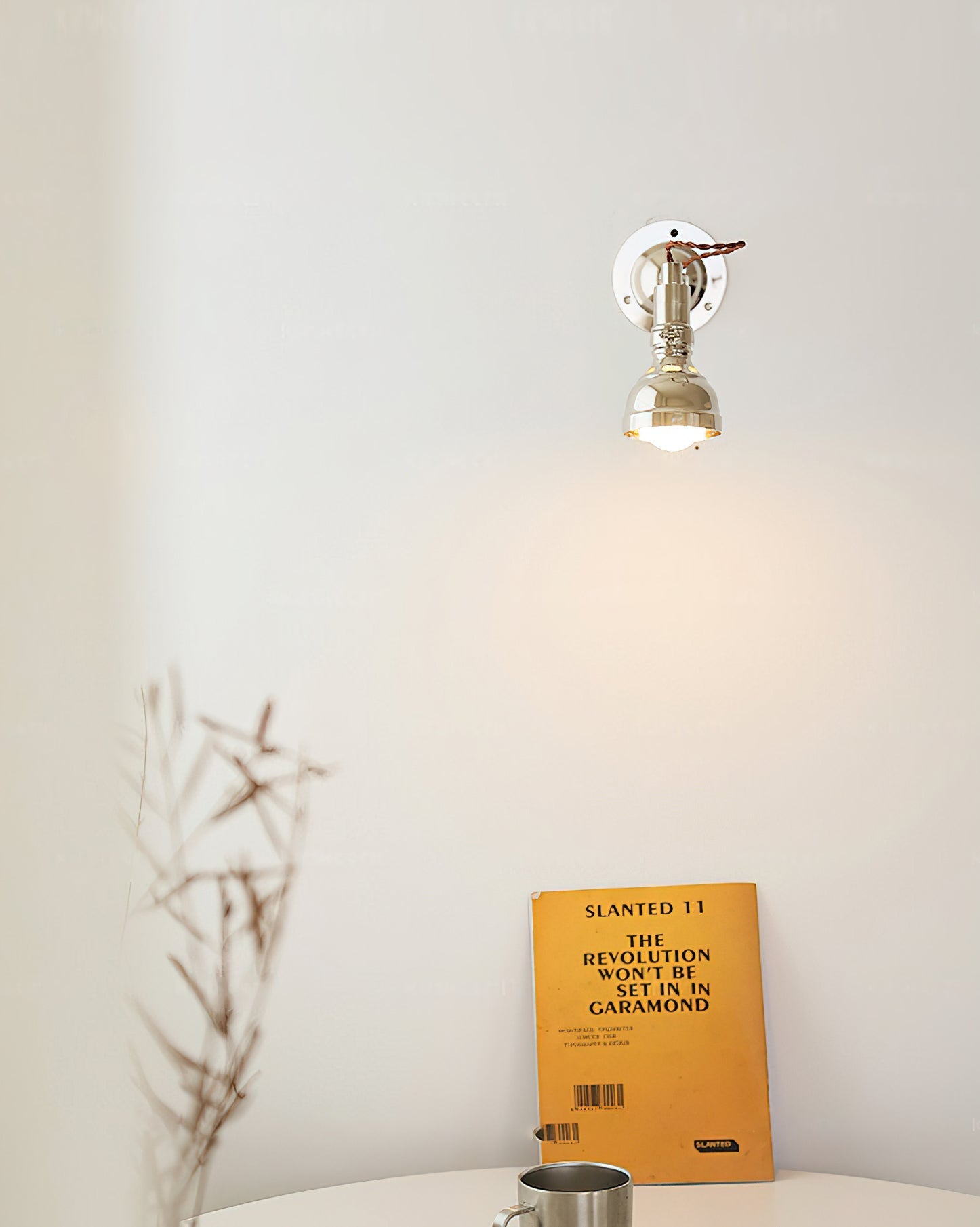 The swing arm mechanism of the Avonni wall lamp.