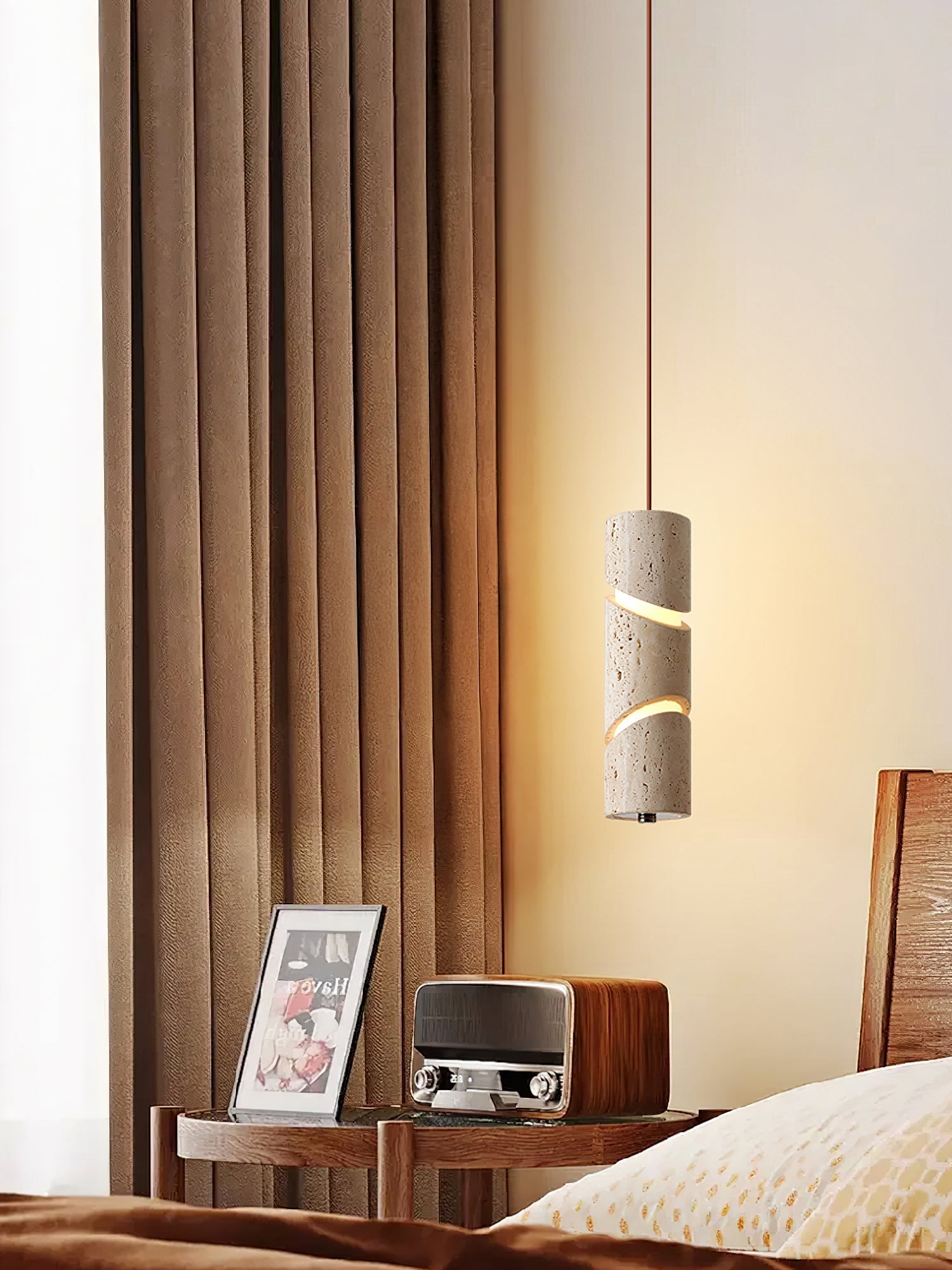 The cylindrical form of the Awsinil Pendant Lamp.