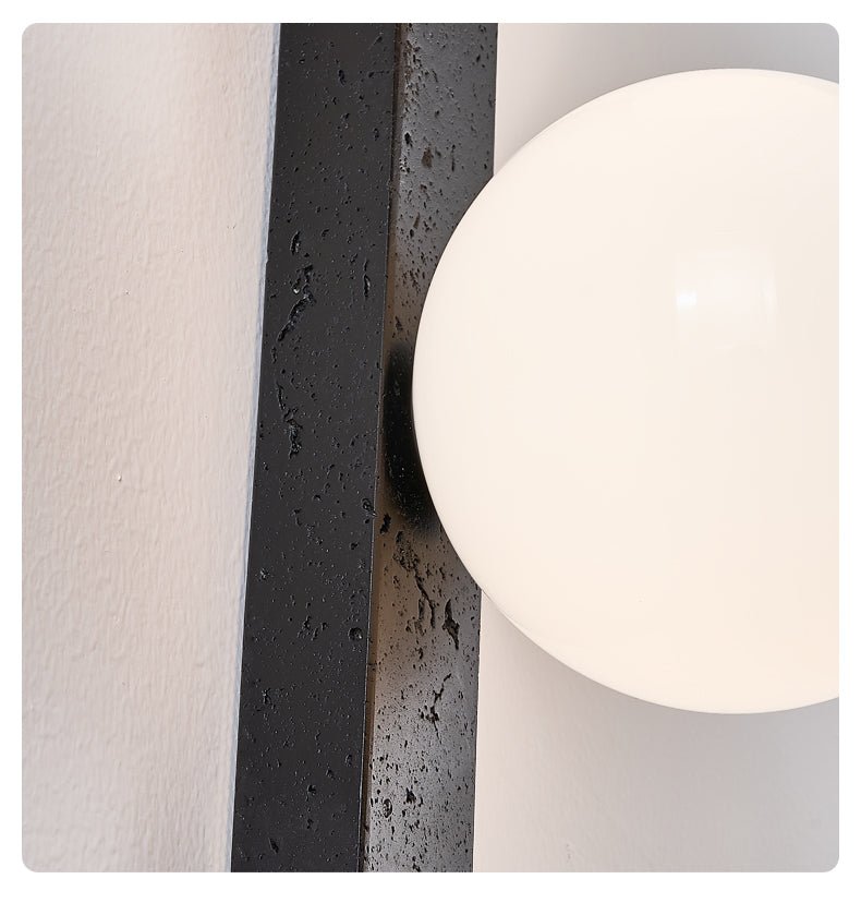 Aria Globe Black Travertine Sconce-Neutral Decor