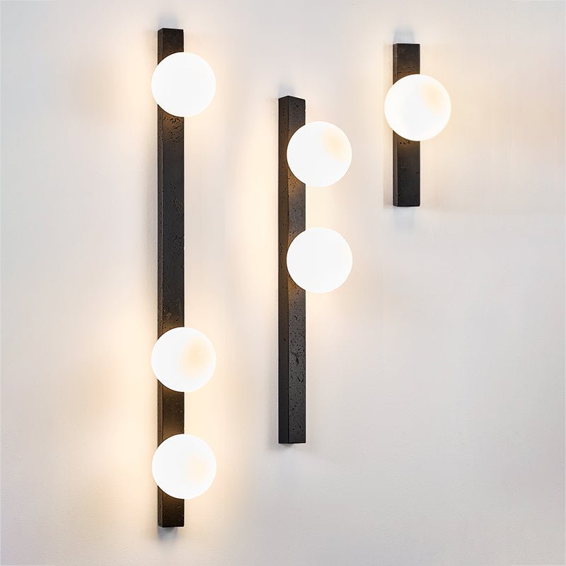 Aria Globe Black Travertine Sconce-Neutral Decor
