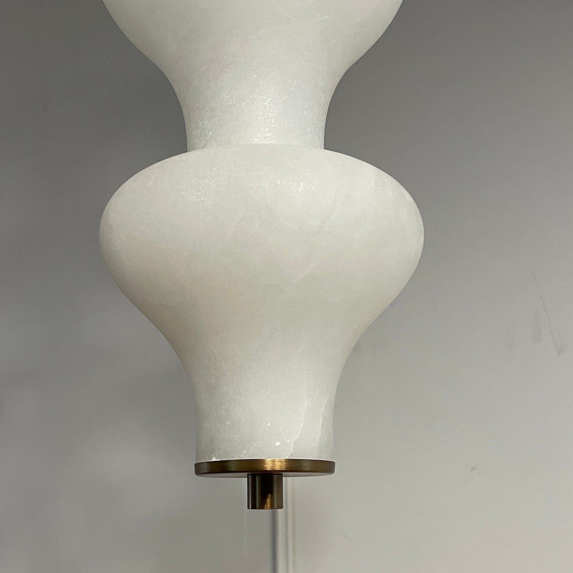 Lifestyle image showing the lamp creating ambiance in a dining area.