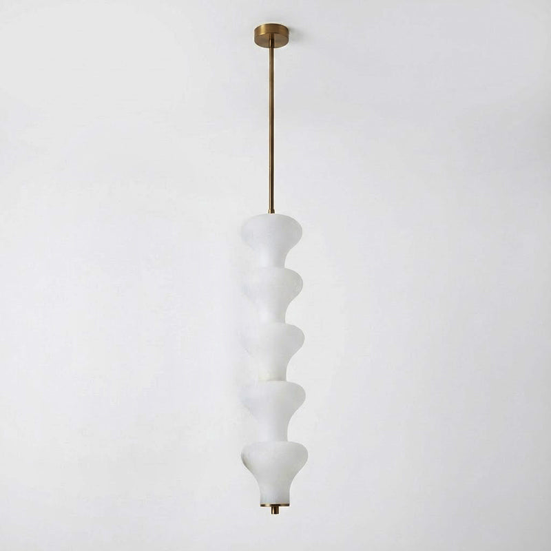 A pair of Balandres pendants hanging over a kitchen island.
