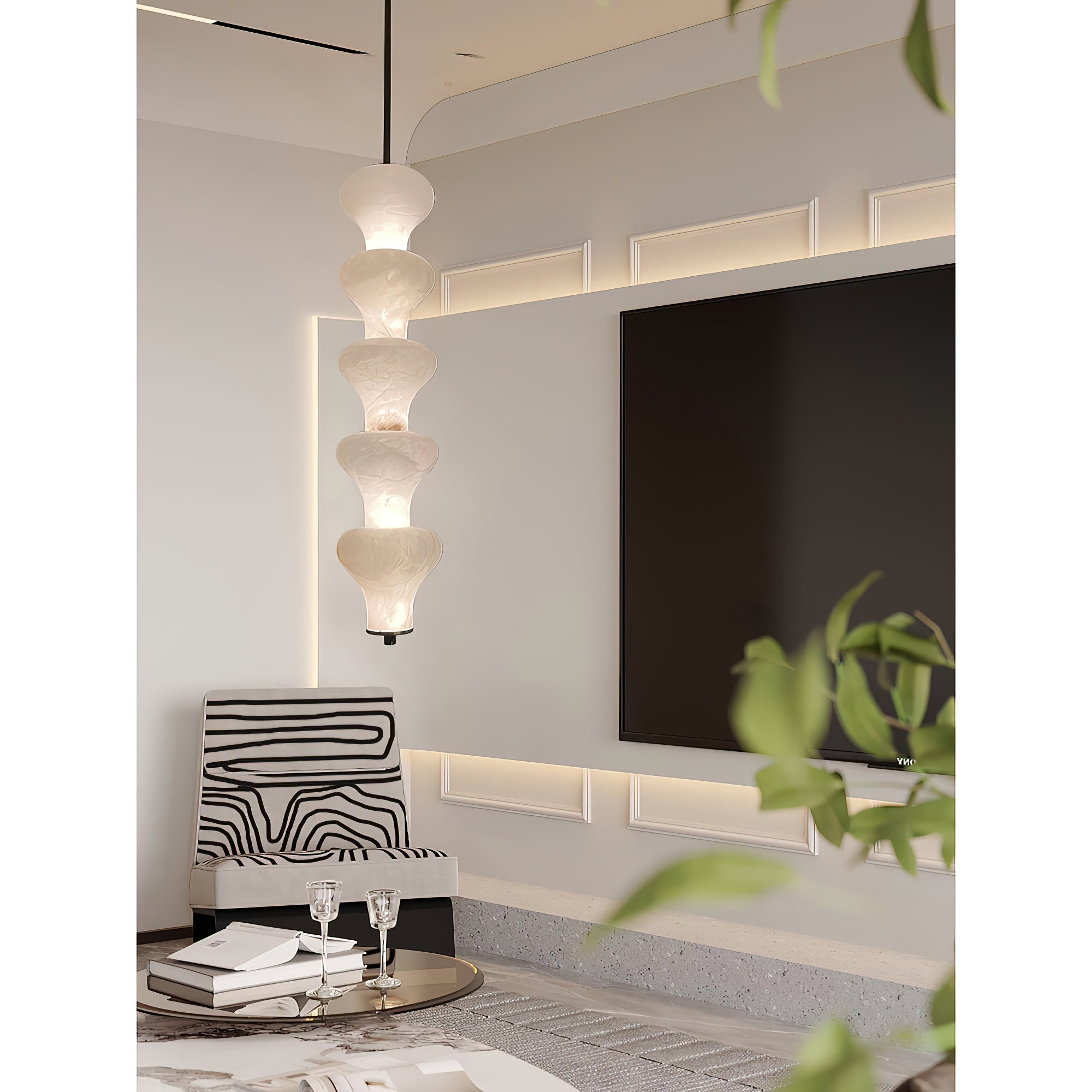 The pendant lamp illuminated, casting a warm and inviting glow.