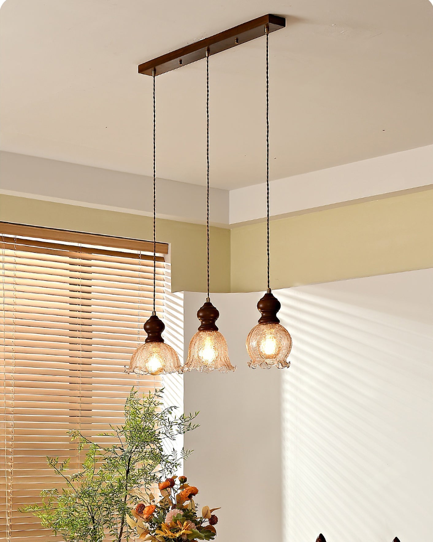Detail shot of the light fixture's wooden component showing the grain.