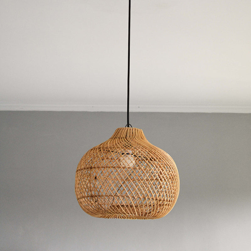 Close-up of the hand-woven rattan texture on the Bawang pendant.