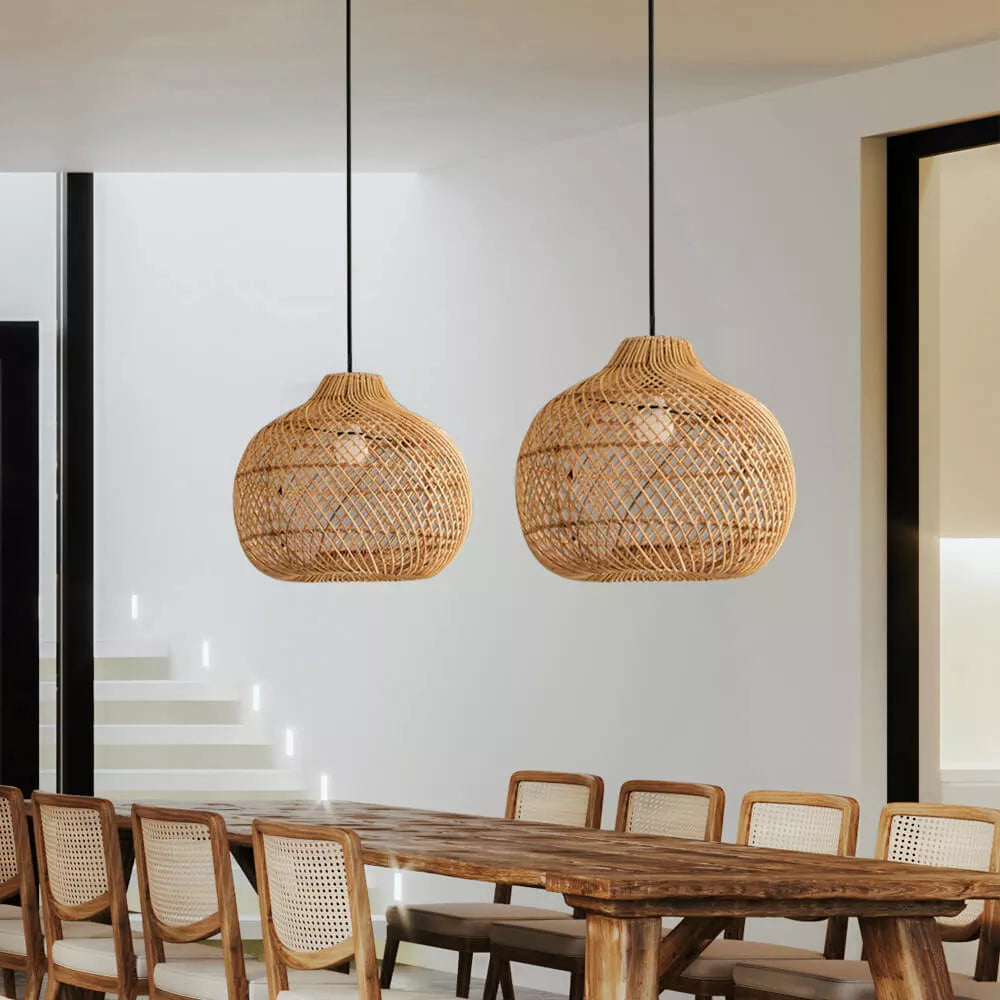 Angled view showcasing the bulbous silhouette of the rattan lamp.