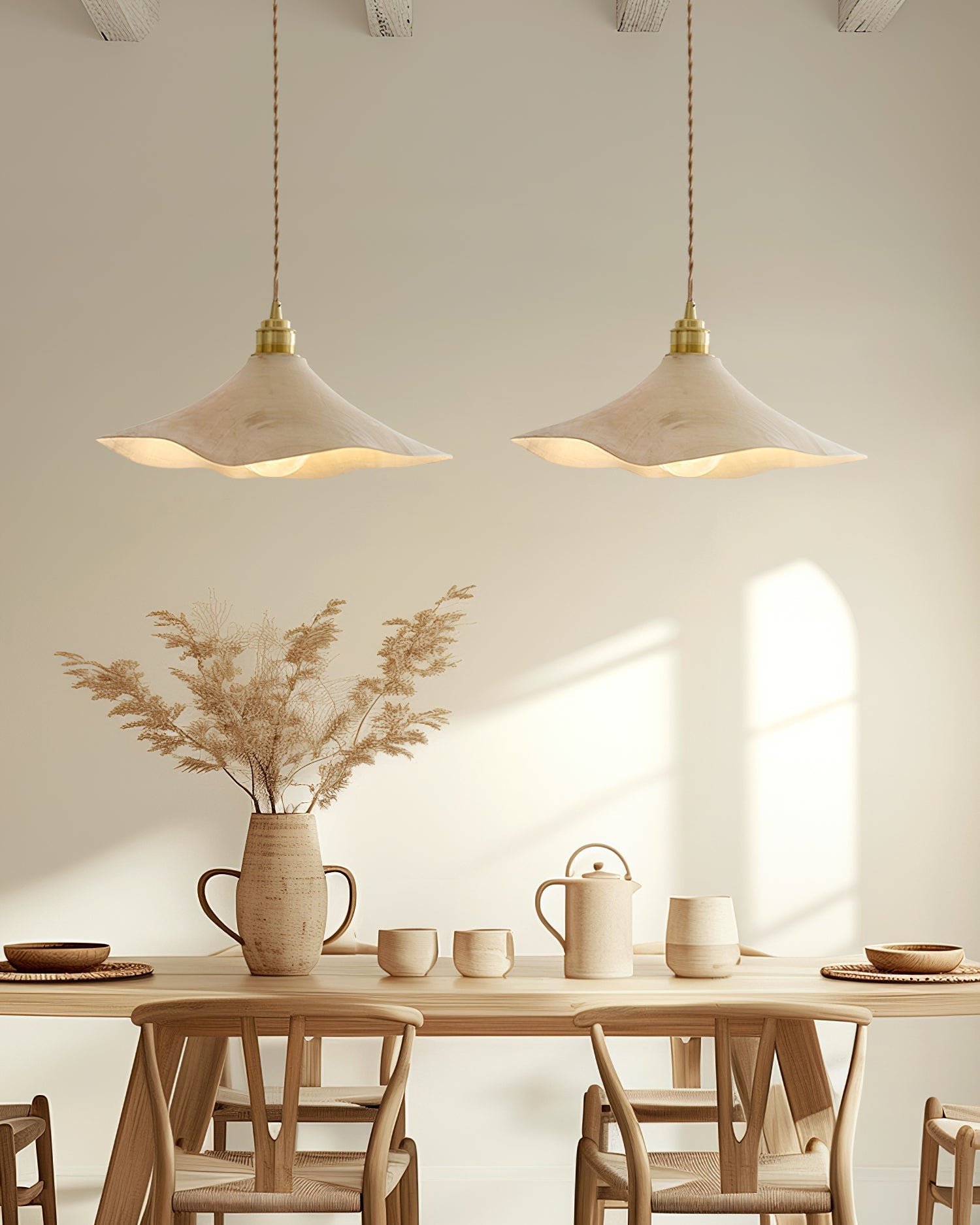 Detail shot of the gold metal accent on the Baxter Pendant Light.