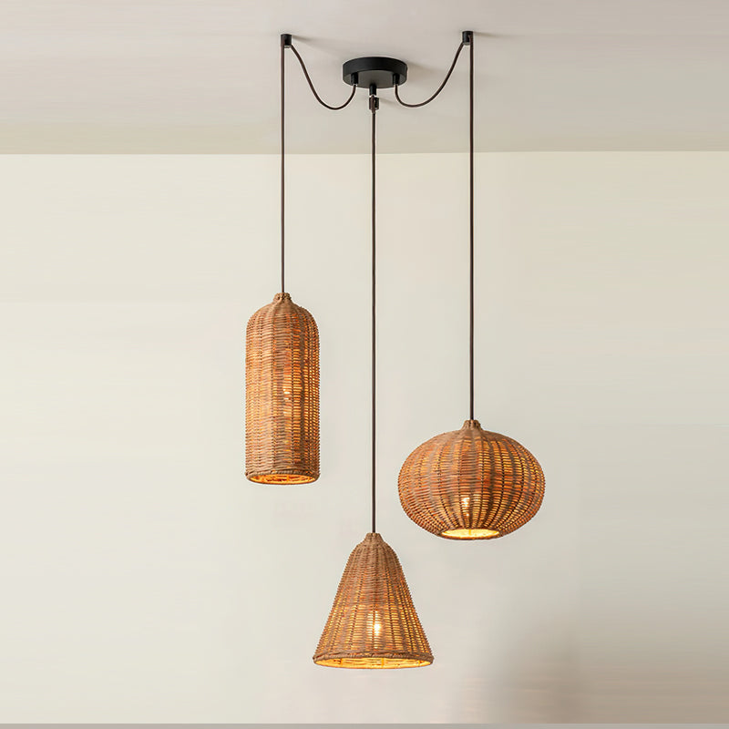 Model D 3-light cluster of Beliani rattan pendant lights in a staggered arrangement.