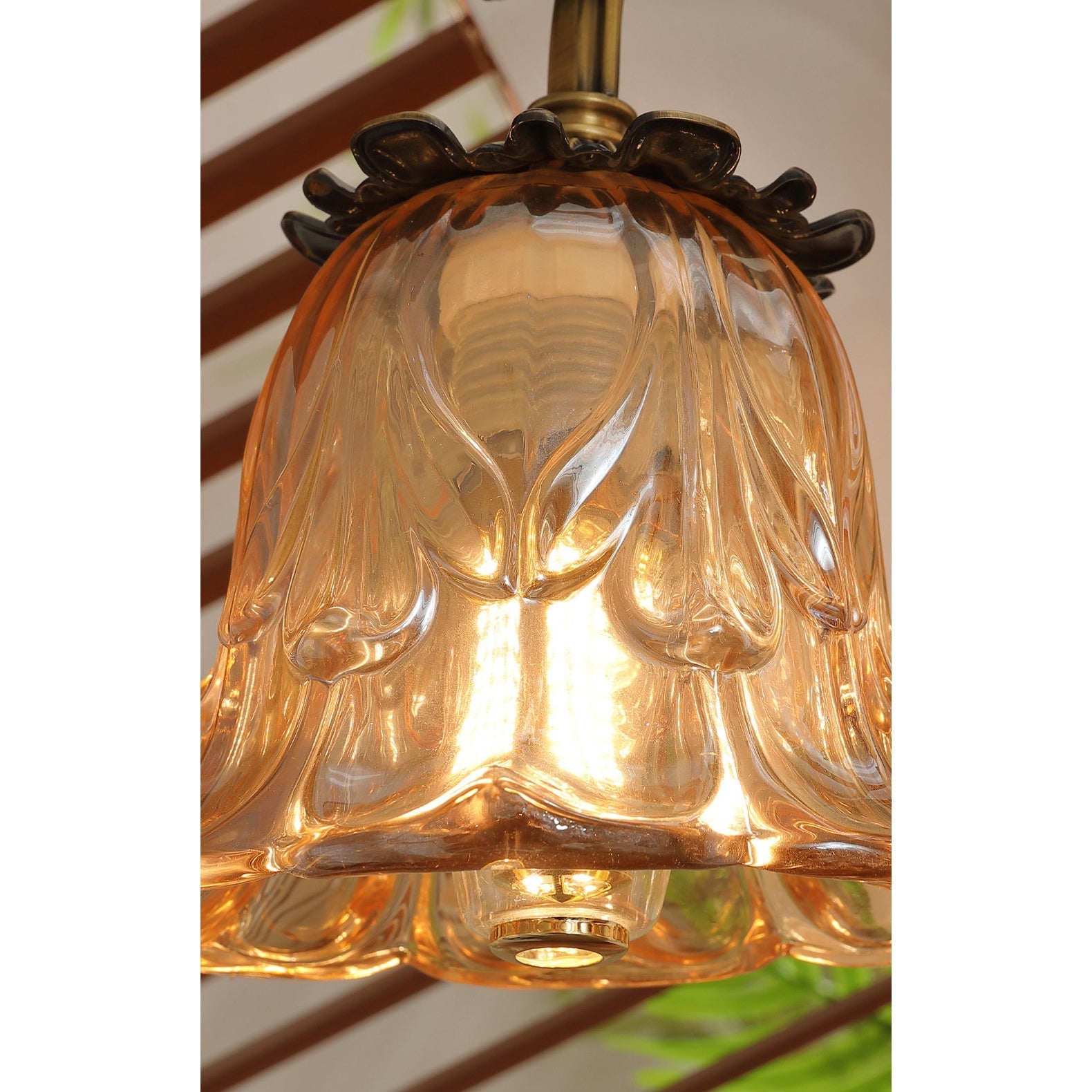 A pair of Benson Wall Lamps mounted on either side of a classic painting.