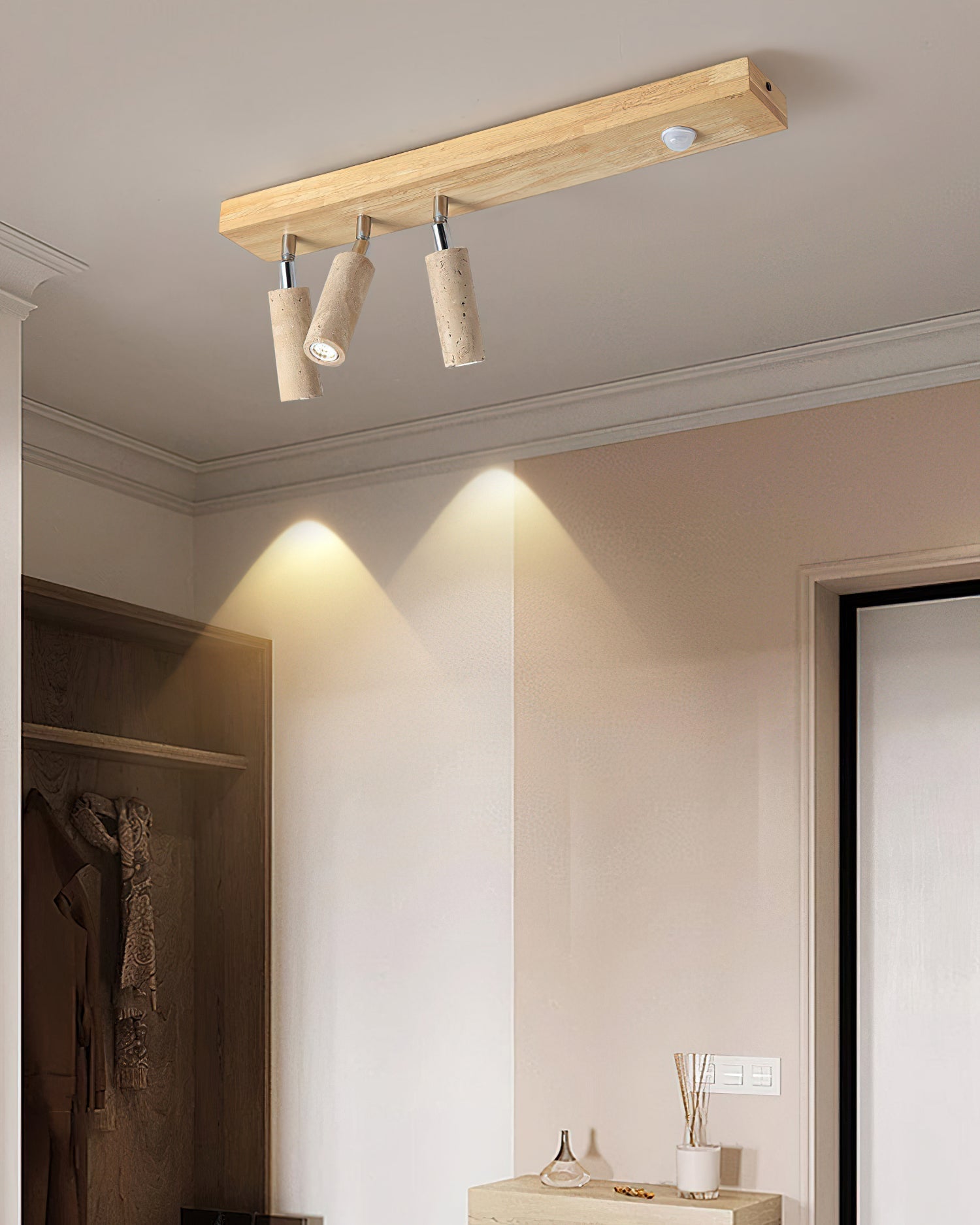 Detail shot of the natural wood grain on the Berge ceiling light's base.