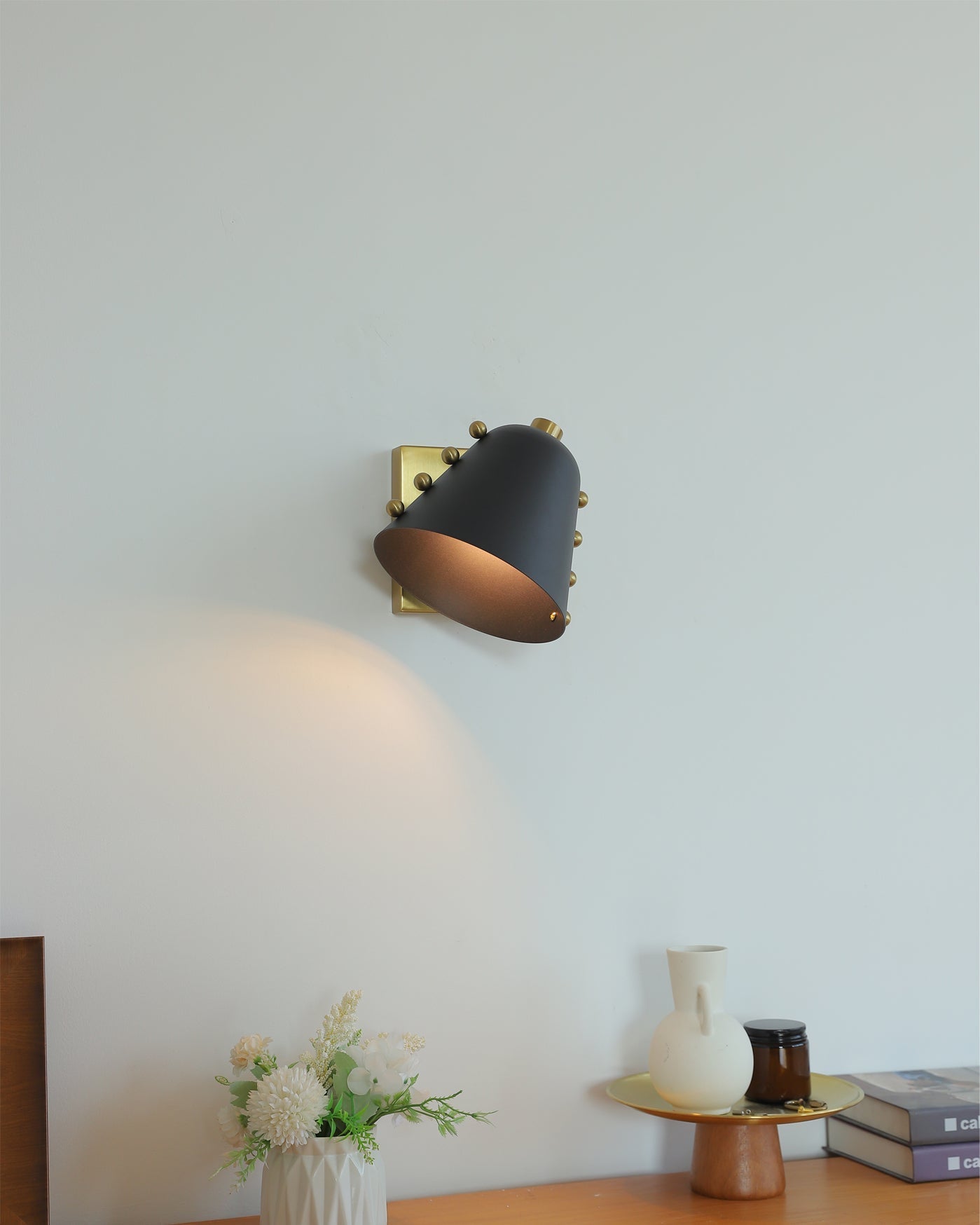 Close-up of the chrome finish on the Bespoke wall lamp.