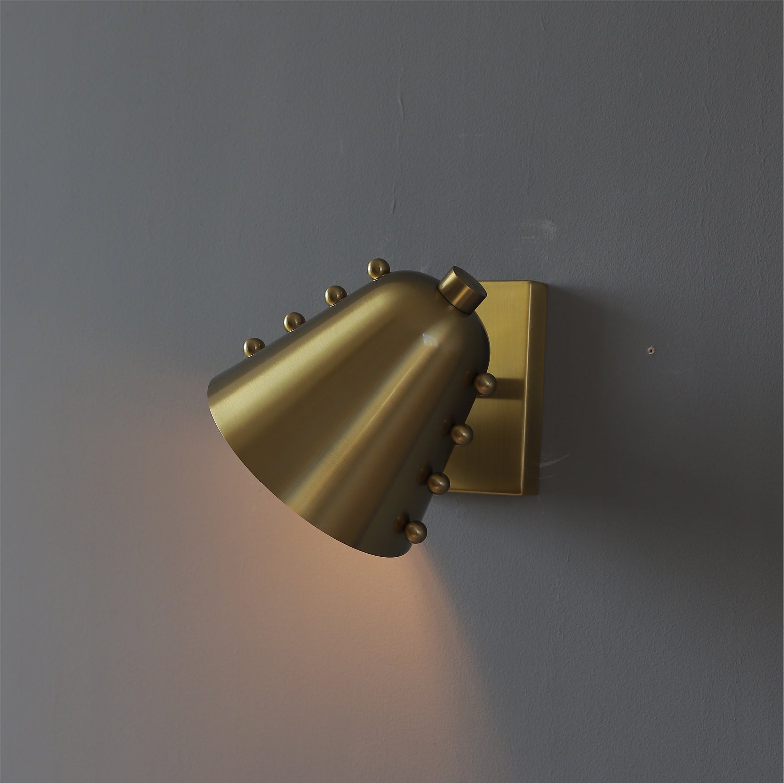 Abstract shot of the Bespoke wall lamp's lines and angles.