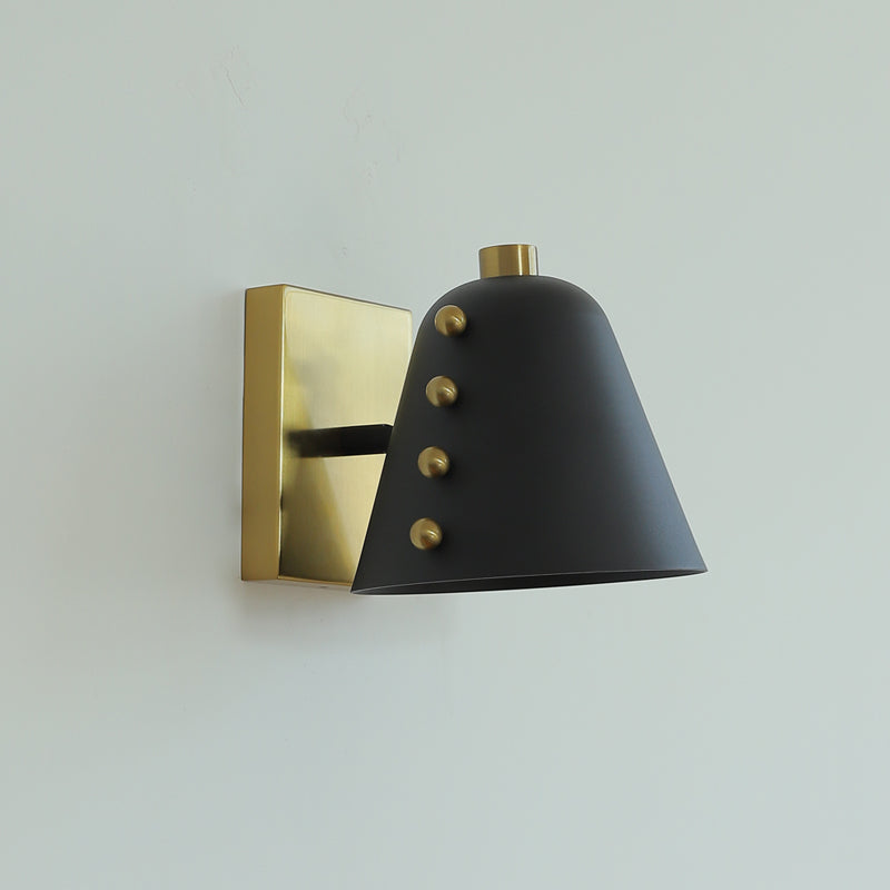 Bespoke wall lamp lit with an LED bulb.
