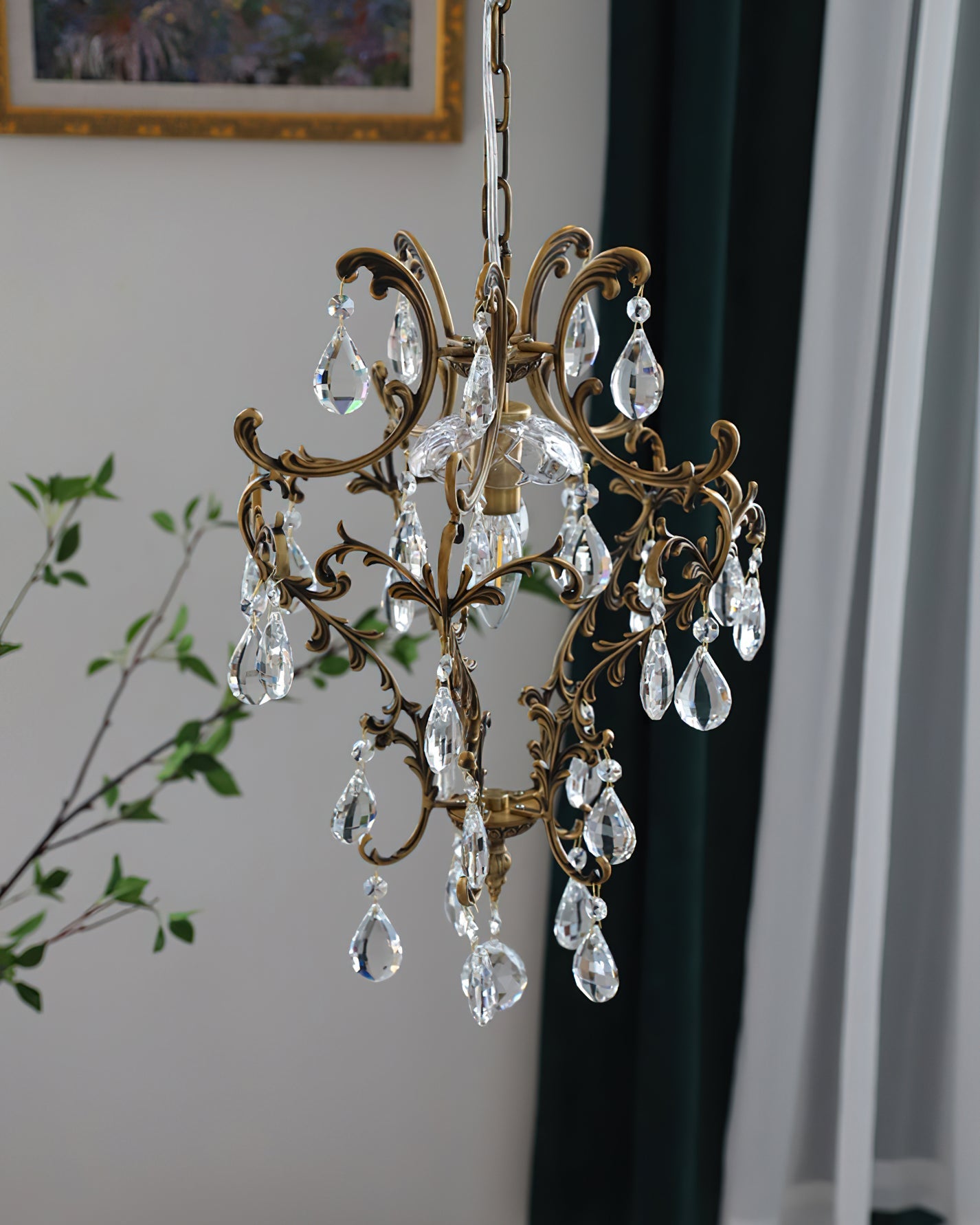 Side view of the brass birdcage pendant light.