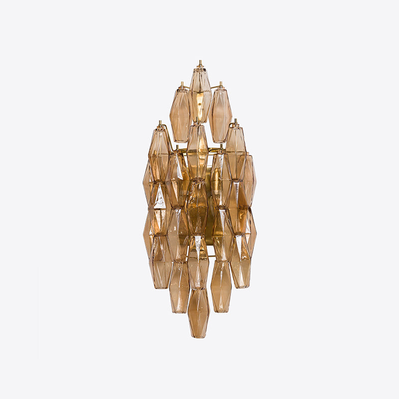 Biscayne Polyhedral Glass Sconce in a pink finish.