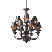 Blanche Chandelier in black with a polished brass body.