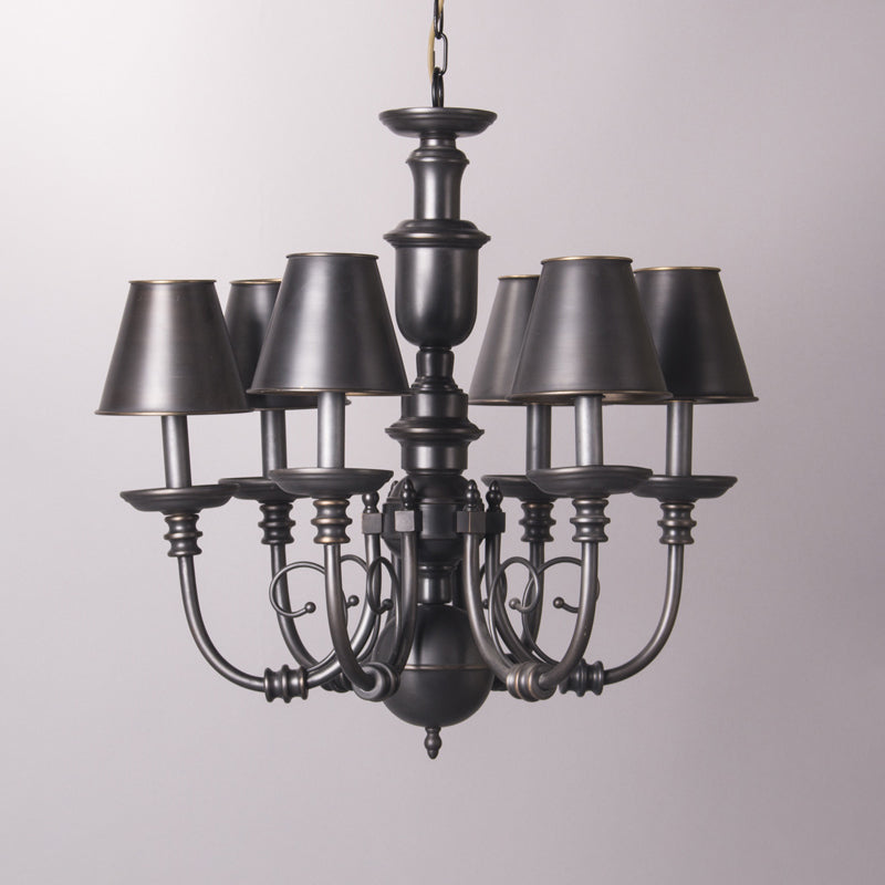 Blanche Chandelier illuminated, casting a warm and diffused glow.
