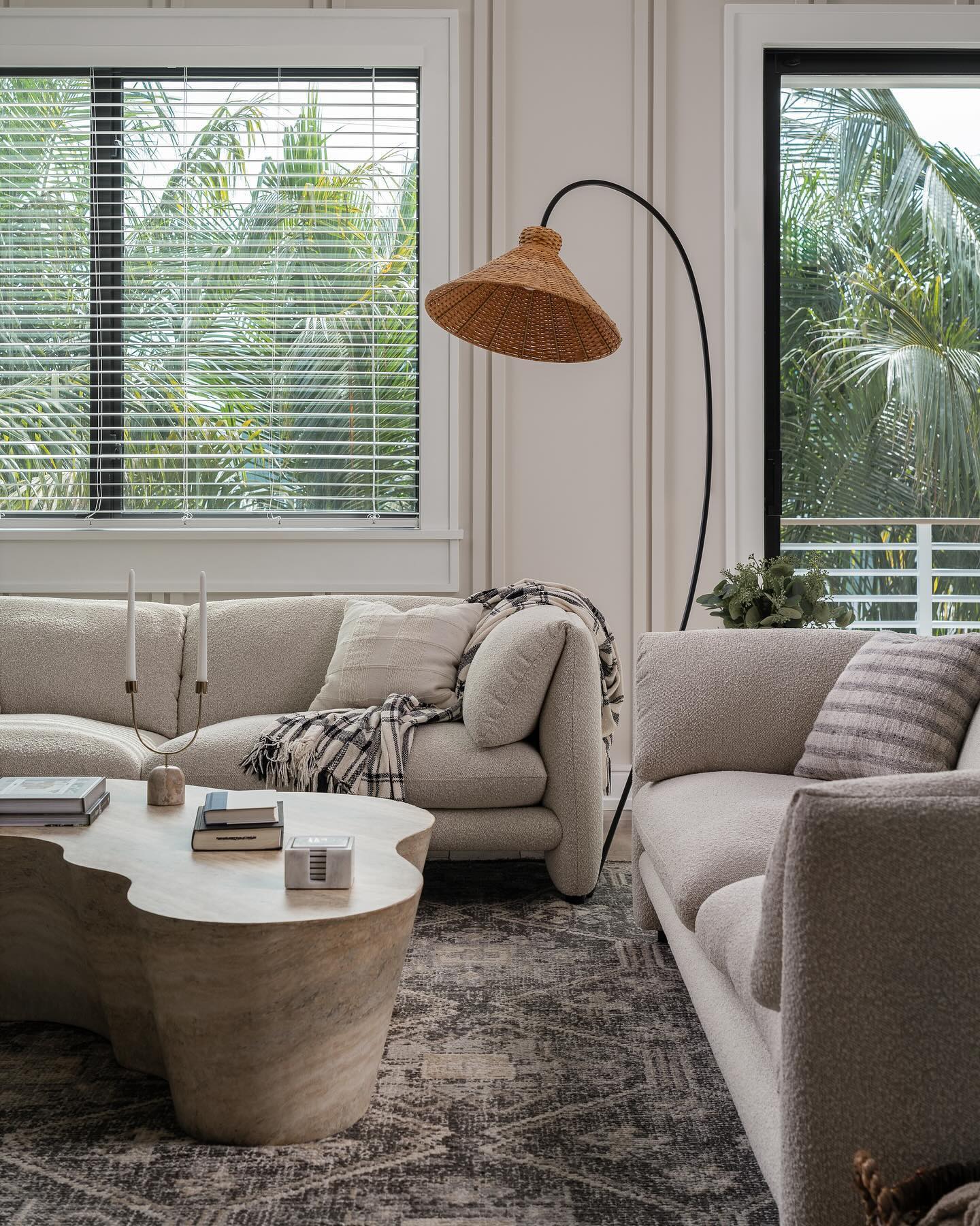 Boa Rattan Floor Lamp from a side angle, highlighting its height.