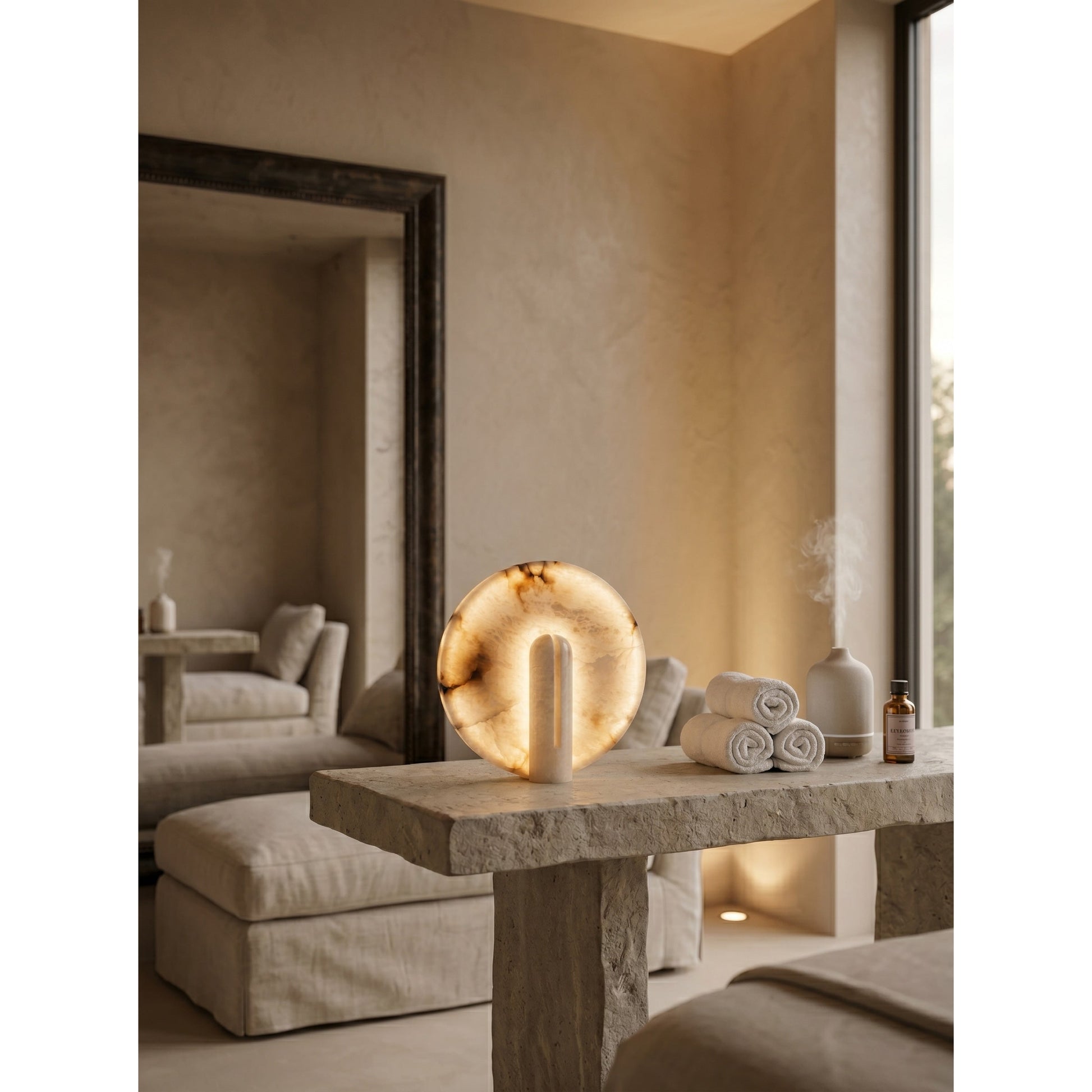 Bonnie Alabaster Table Lamp styled on a wooden side table.