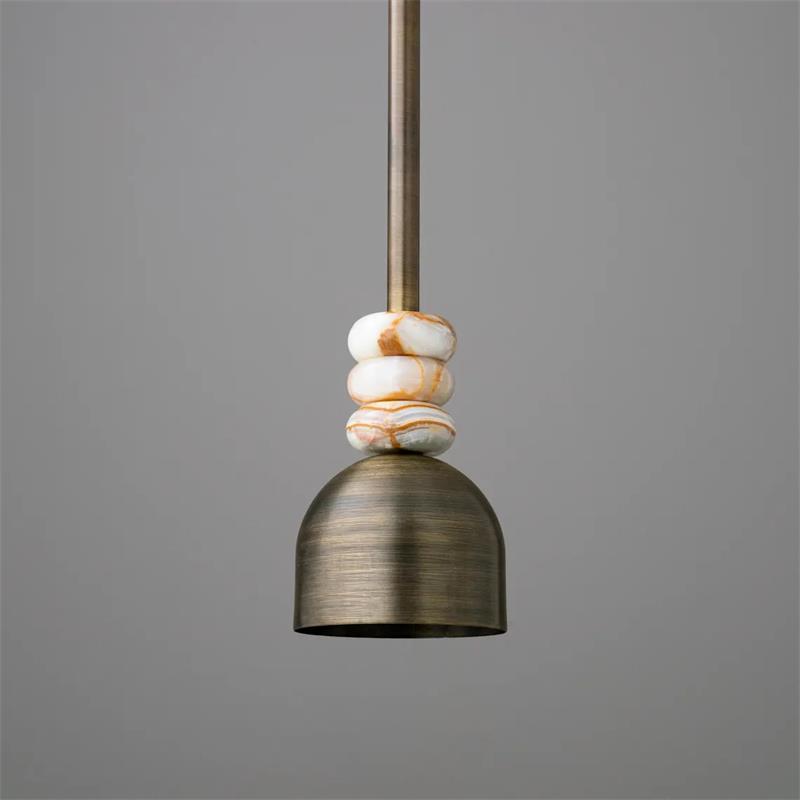 Lifestyle image of the Boston Pendant Lamp over a kitchen island.
