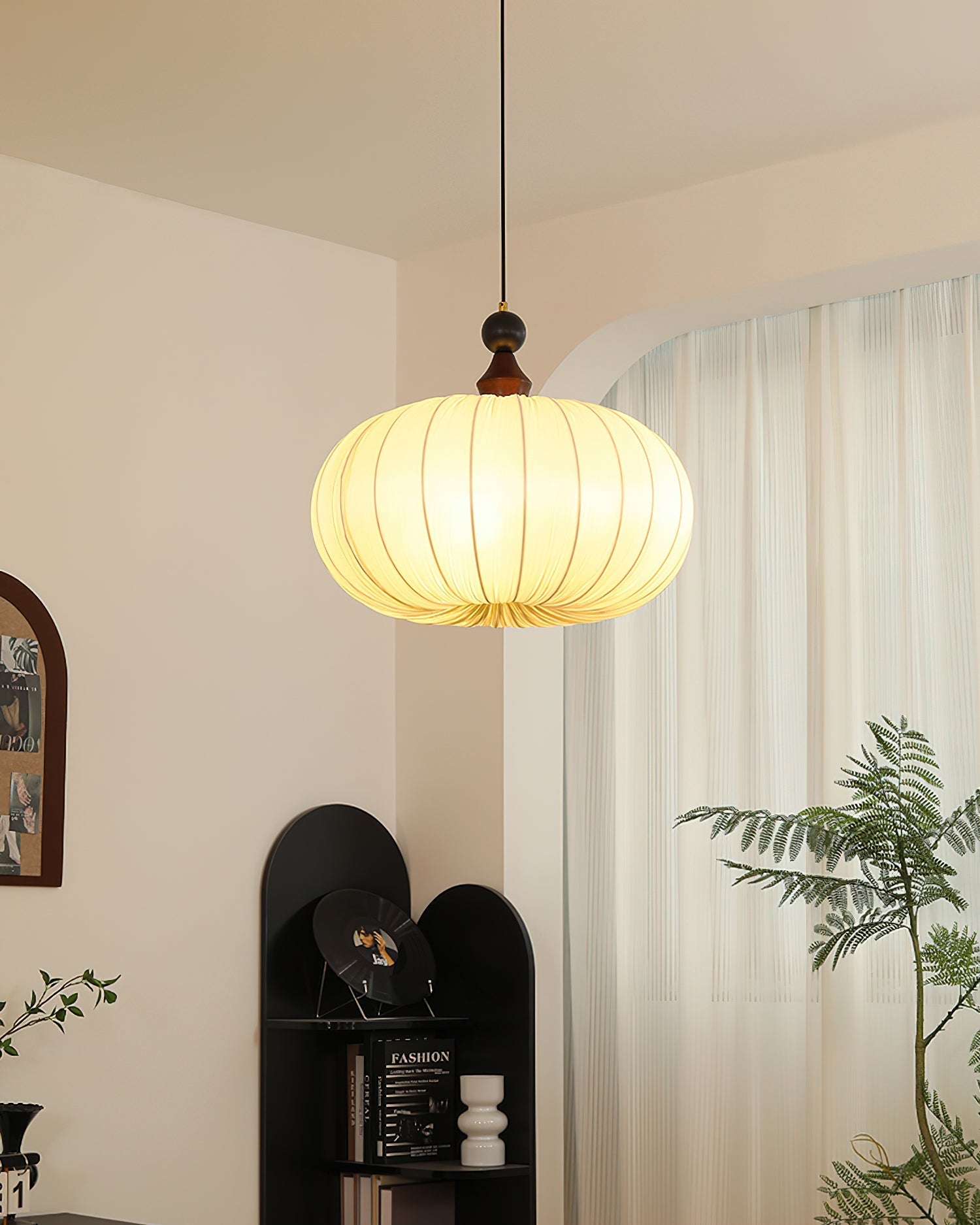 Detail shot of the wooden top accent of the Bowie Pendant Light.