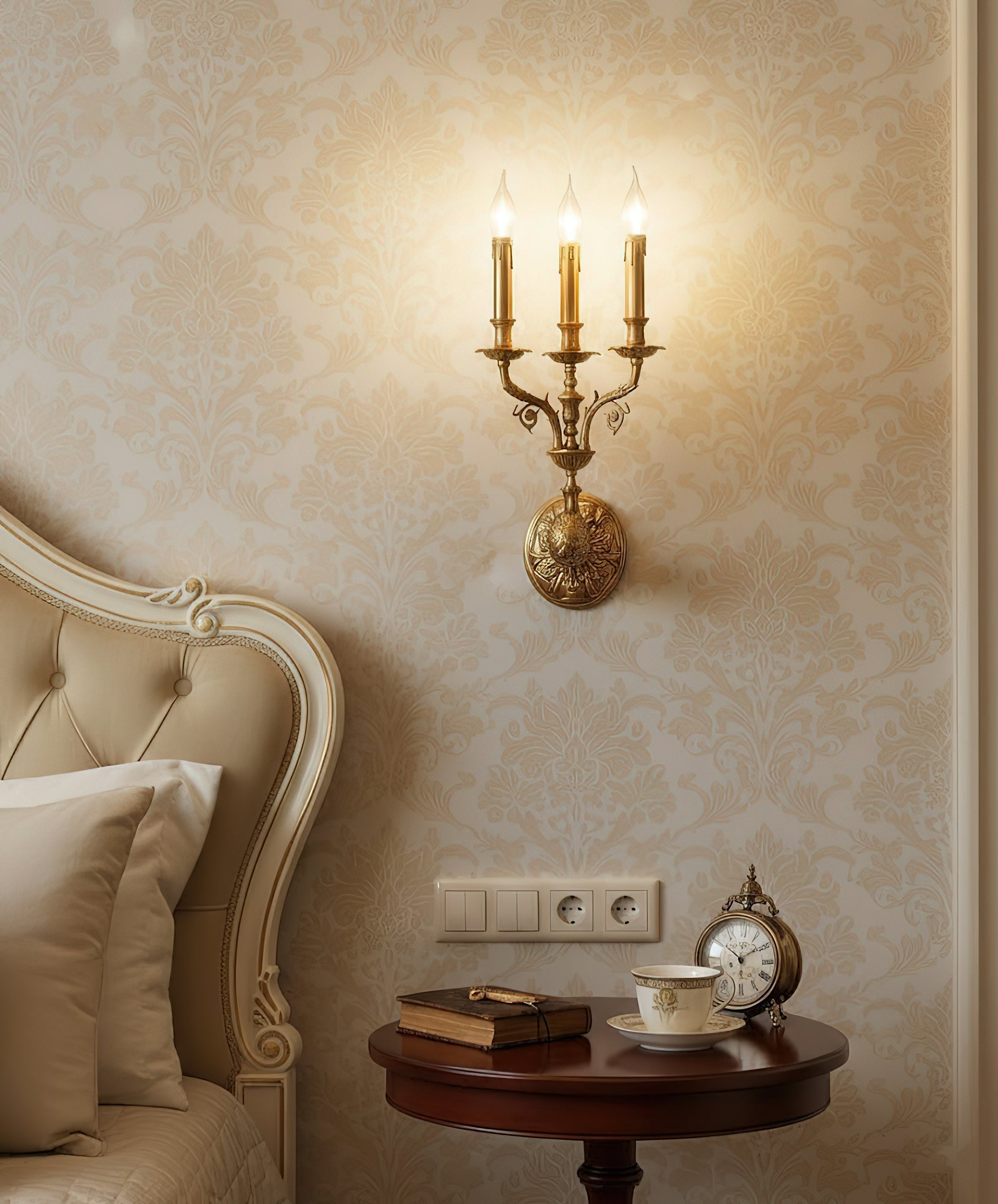 Close-up of the brass body of the Brad Palace Wall Lamp.