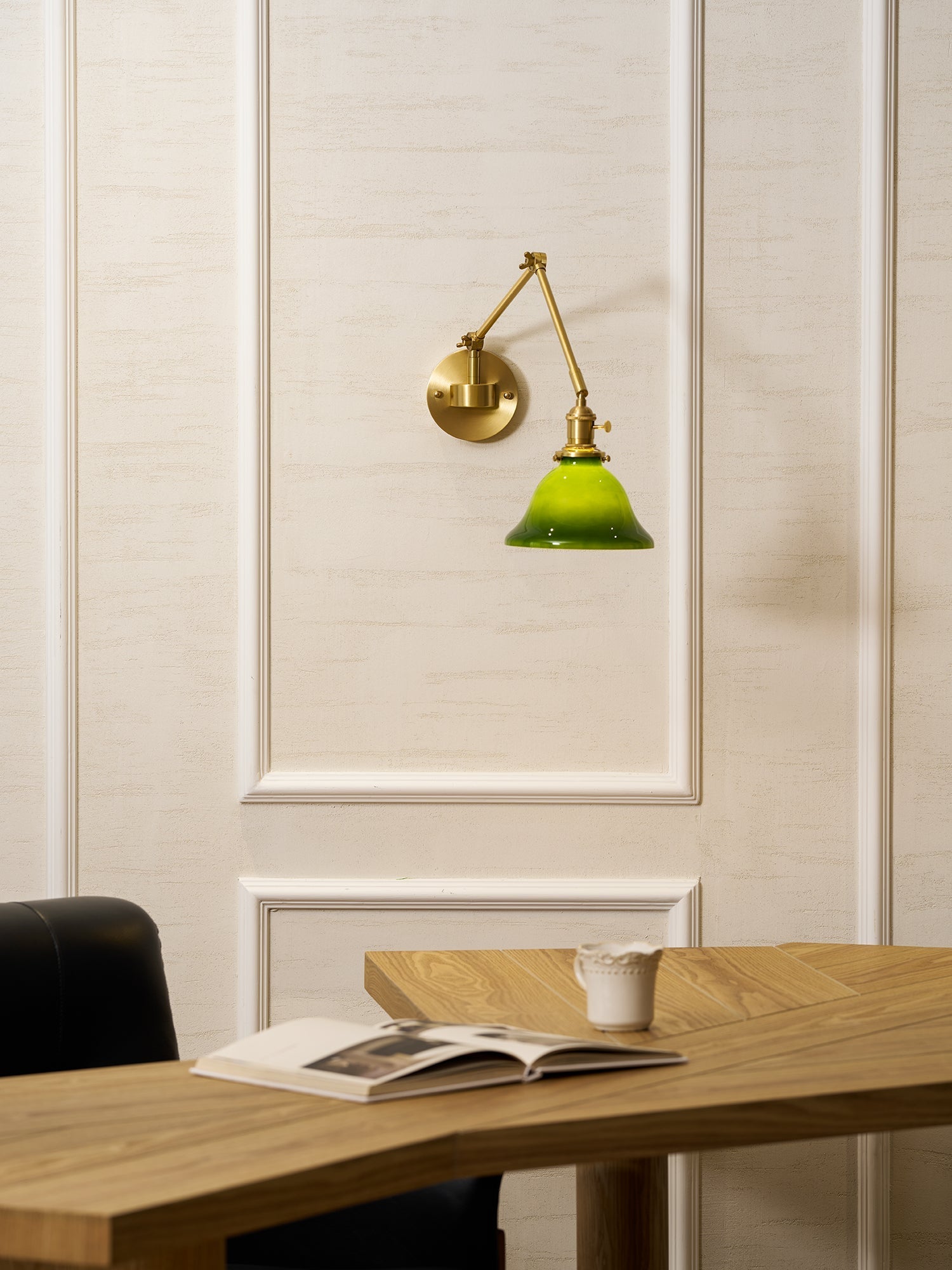 Brady wall lamp in a reading nook setting.