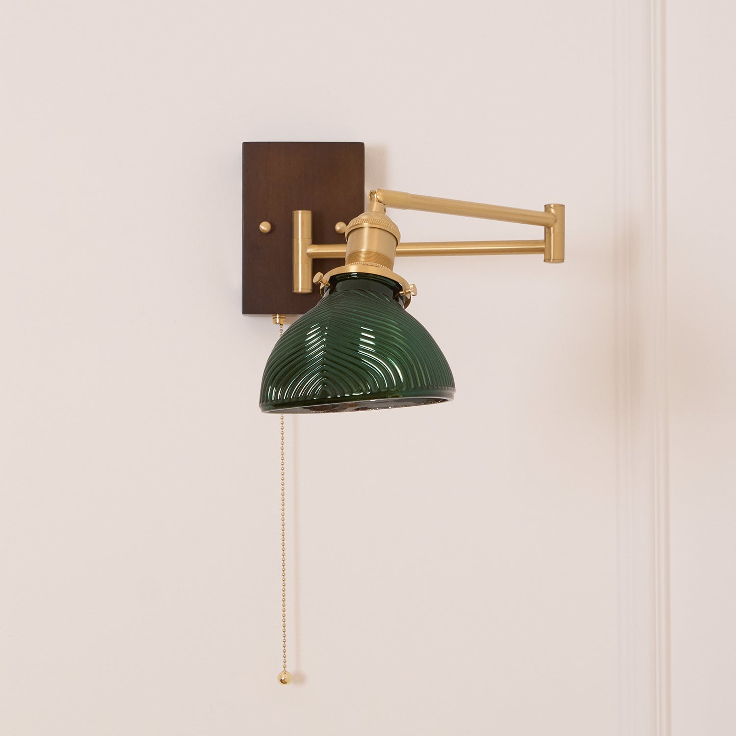 Emeric Adjustable Swing Arm Wall Lamp with Green Glass Shade