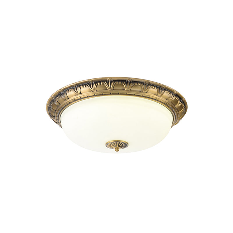 Close-up on the smooth, white glass shade.
