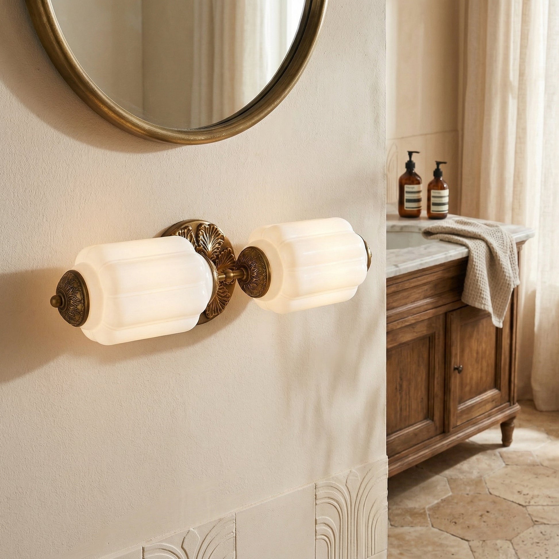 Eloise Scallop Glass Sconce shown in a blue finish.