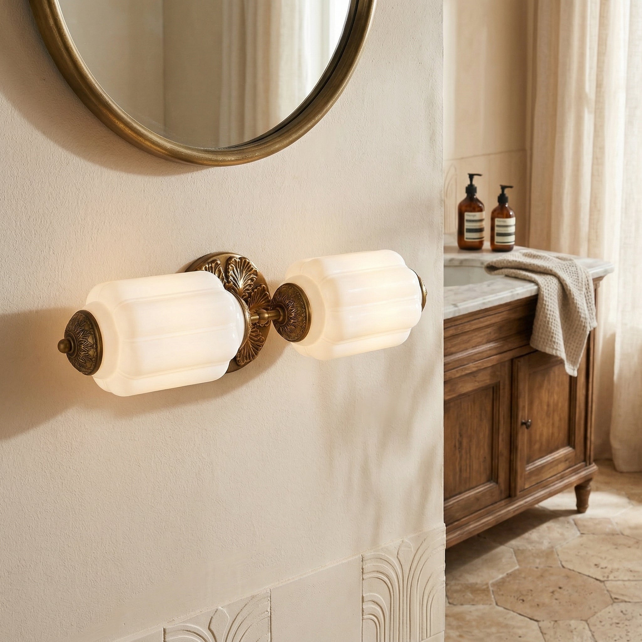 Eloise Scallop Glass Sconce shown in a blue finish.