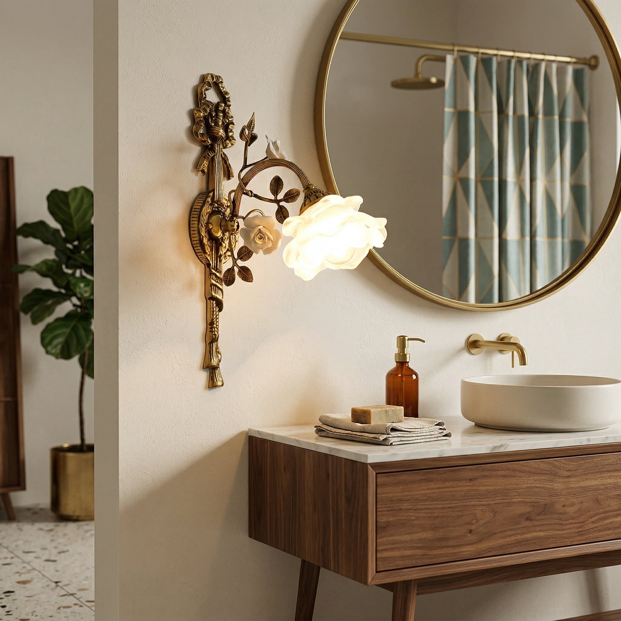 The Rosalie wall lamp illuminated, casting a warm glow.
