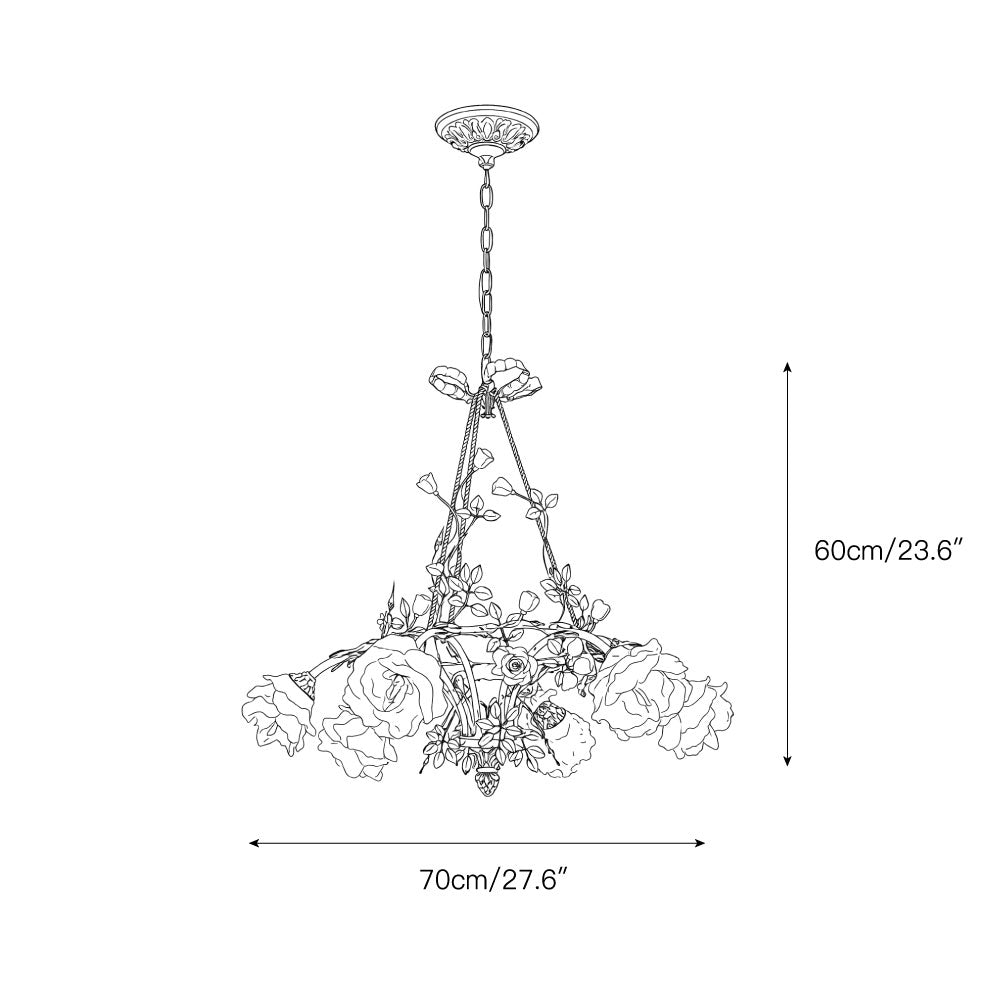 The Briar Rose Chandelier illuminated, casting a warm, soft glow.
