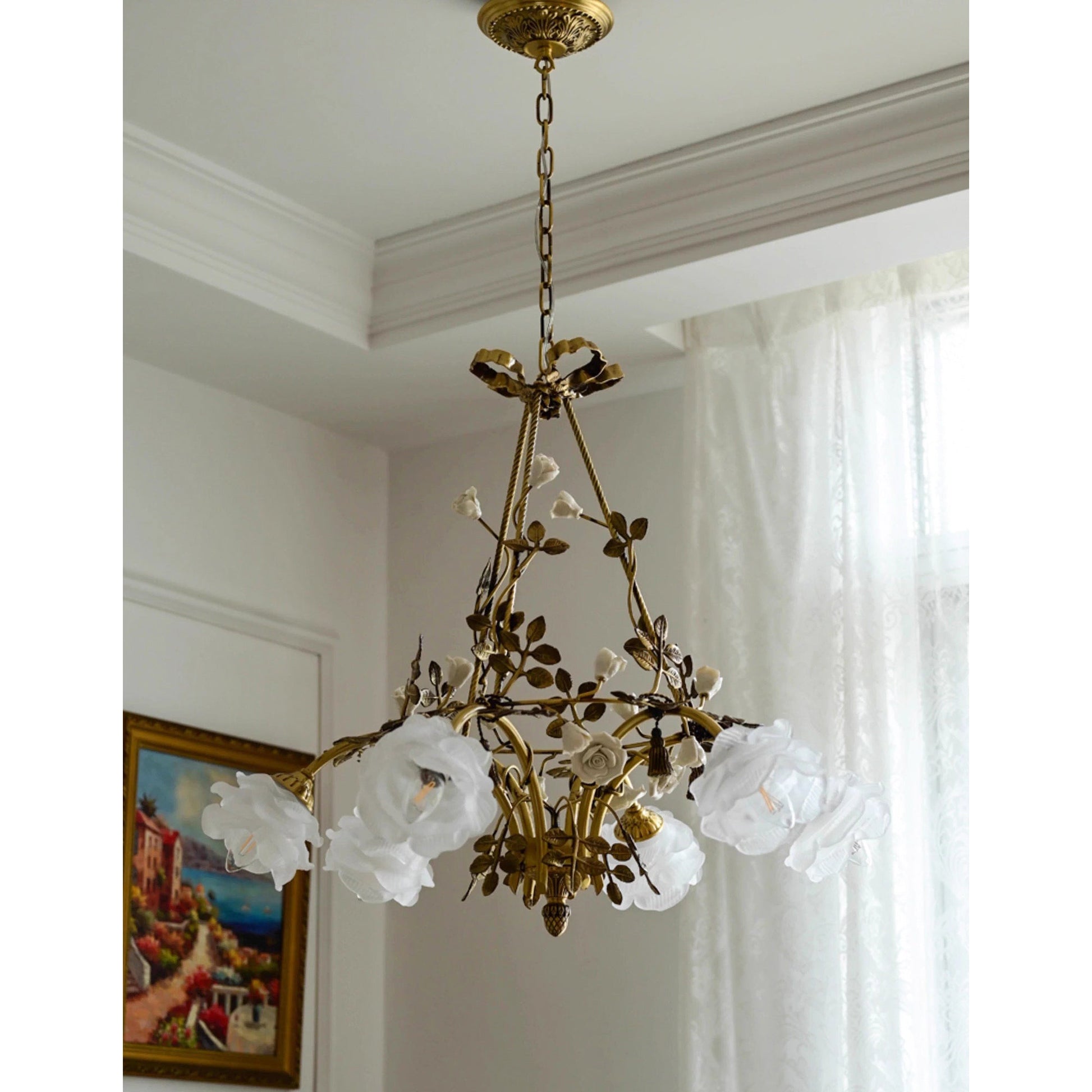 The rose-shaped glass shade unlit, showing its white color.