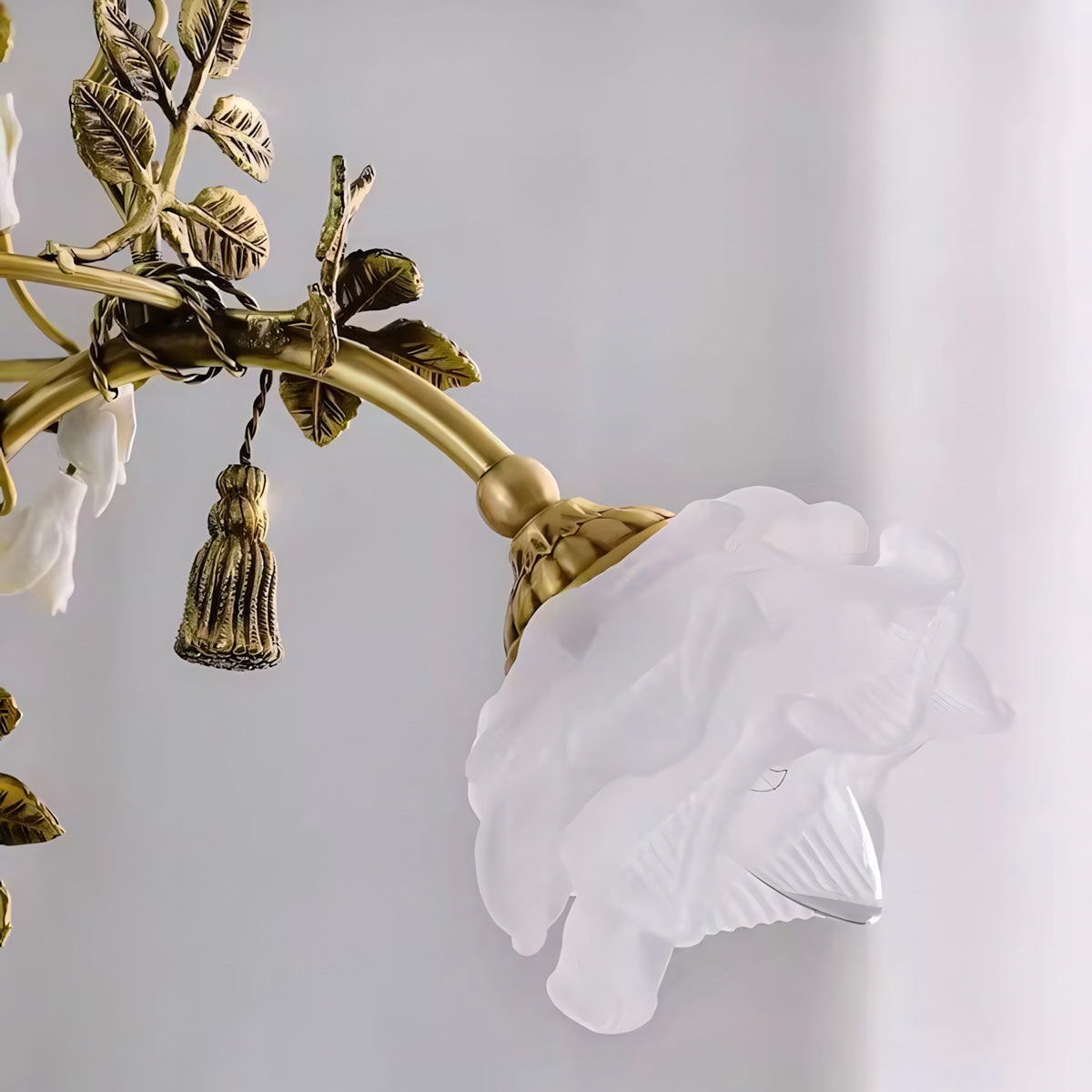 The Briar Rose Chandelier casting romantic shadows on a nearby wall.