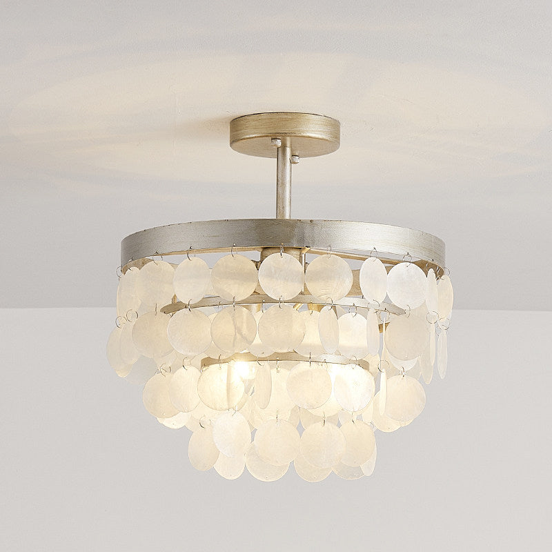 Close-up of the natural shell details on the Brielle Ceiling Lamp.